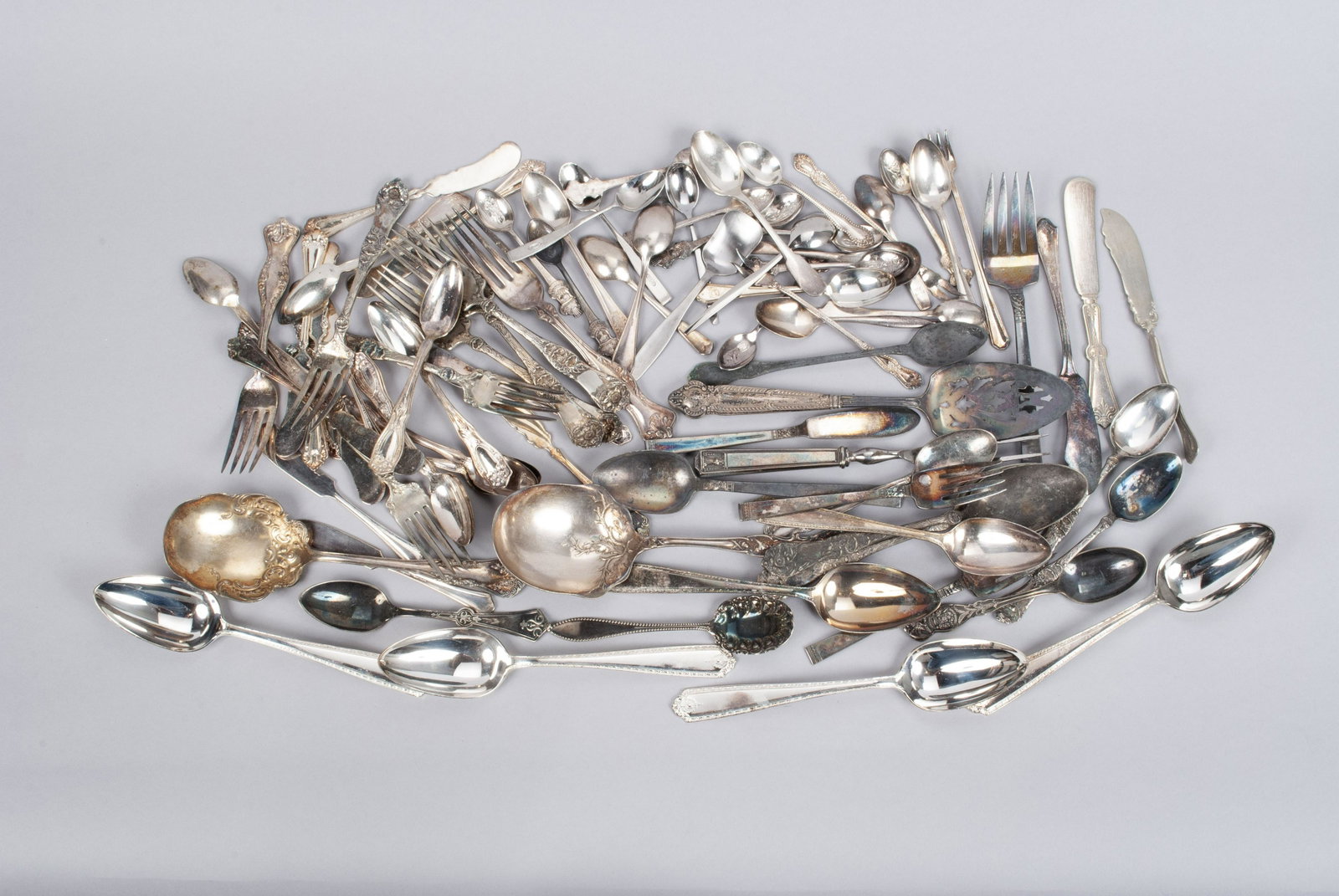 COLLECTION OF ANTIQUE NICKEL, COINSILVER, AND SILVER PLATE FLATWARE: COLLECTION OF ANTIQUE NICKEL, COINSILVER, AND SILVER PLATE FLATWARE Mid-19th-mid-20th century, silver content. Over five dozen (60+) examples including several hallmarked examples and rare early forms