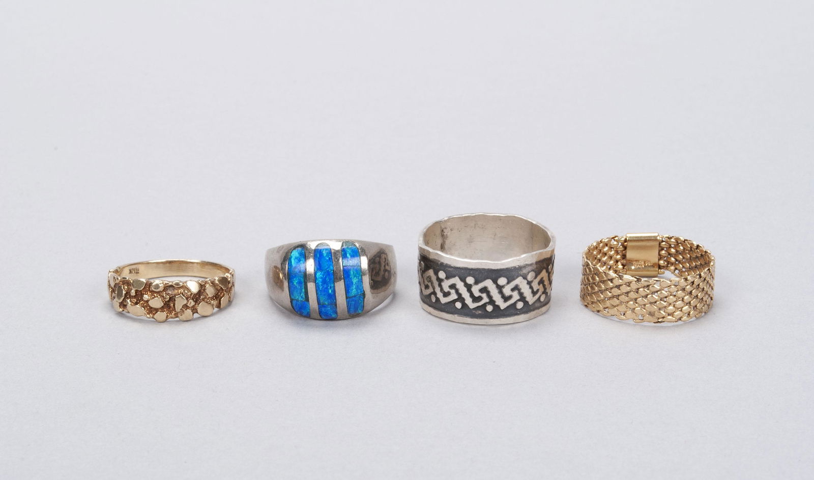 FOUR MENS' RINGS (1 of 5)