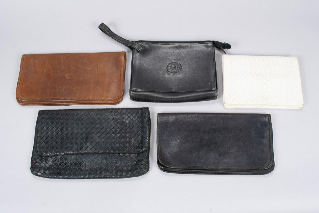 FIVE DESIGNER HANDBAGS: FIVE DESIGNER HANDBAGSLate 20th - early 20th century, leather. Five (5) individual purses including Gucci, Coach, Bottega Veneta, and more.