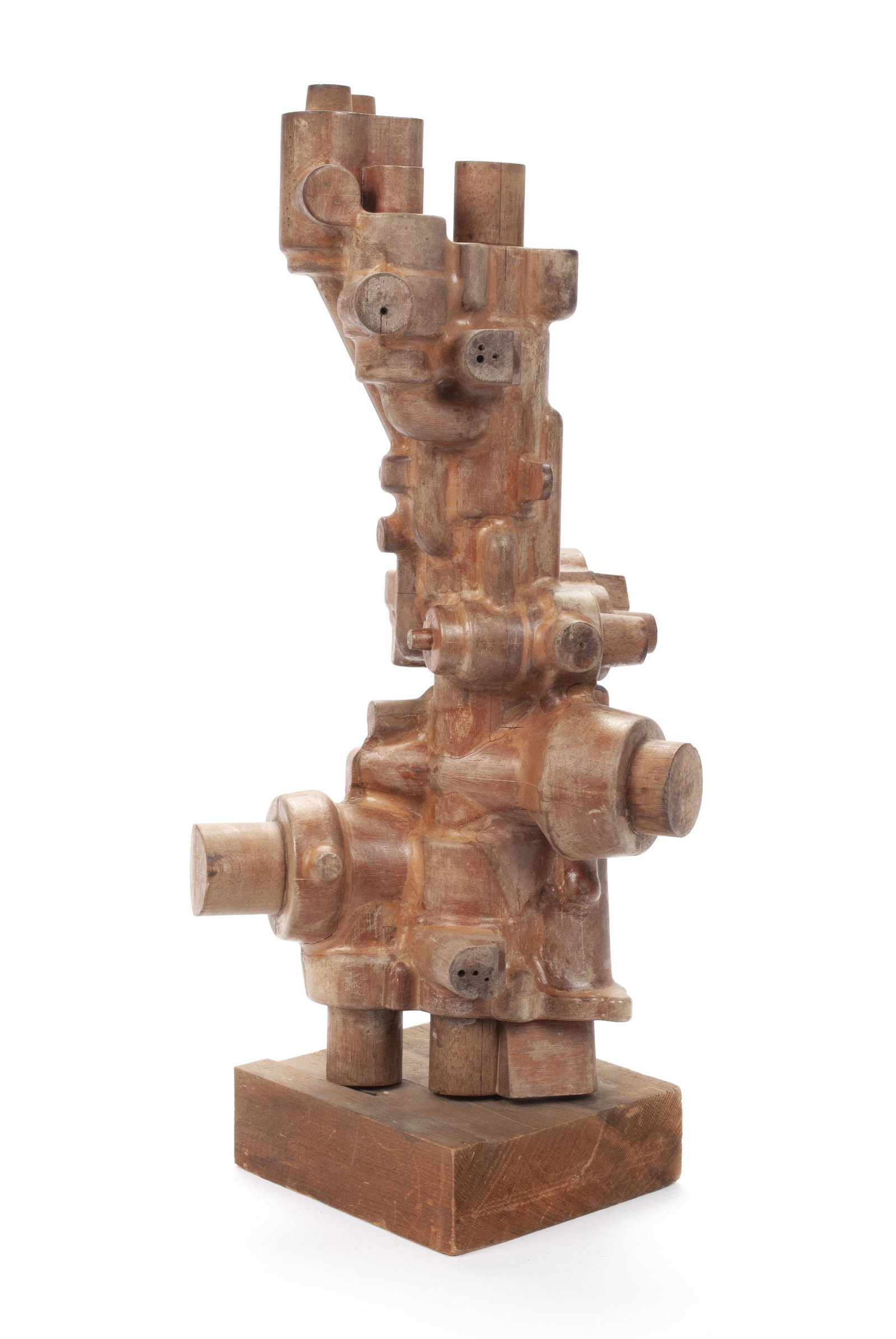 MECHANICAL WOODEN SCULPTURE: MECHANICAL WOODEN SCULPTURE Polished wood, unsigned. Intricate and figurative industrial tabletop form, mounted to square, raw wooden base. 19.75 height, 8" width, 6" depth