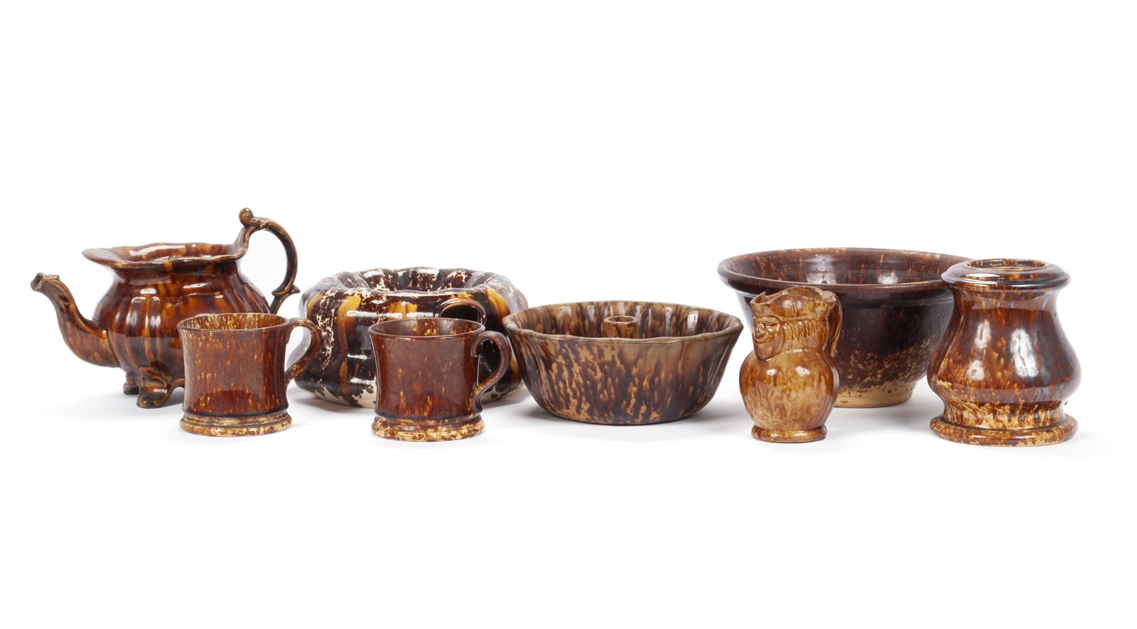 EIGHT BENNINGTON TYPE POTTERY ARTICLES (1 of 6)