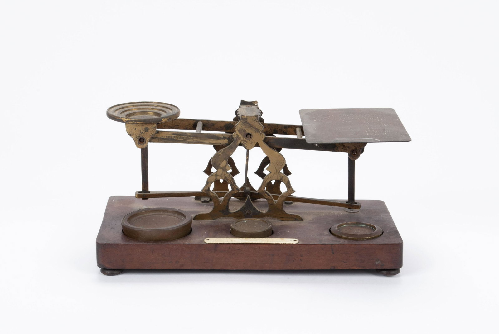 EARLY BRASS POSTAGE SCALE: EARLY BRASS POSTAGE SCALE S. Mordan & Co., London, Circa 1900. A 16 oz weight and two 4 oz weights. 5" height, 10.5" width, 5.25" depth