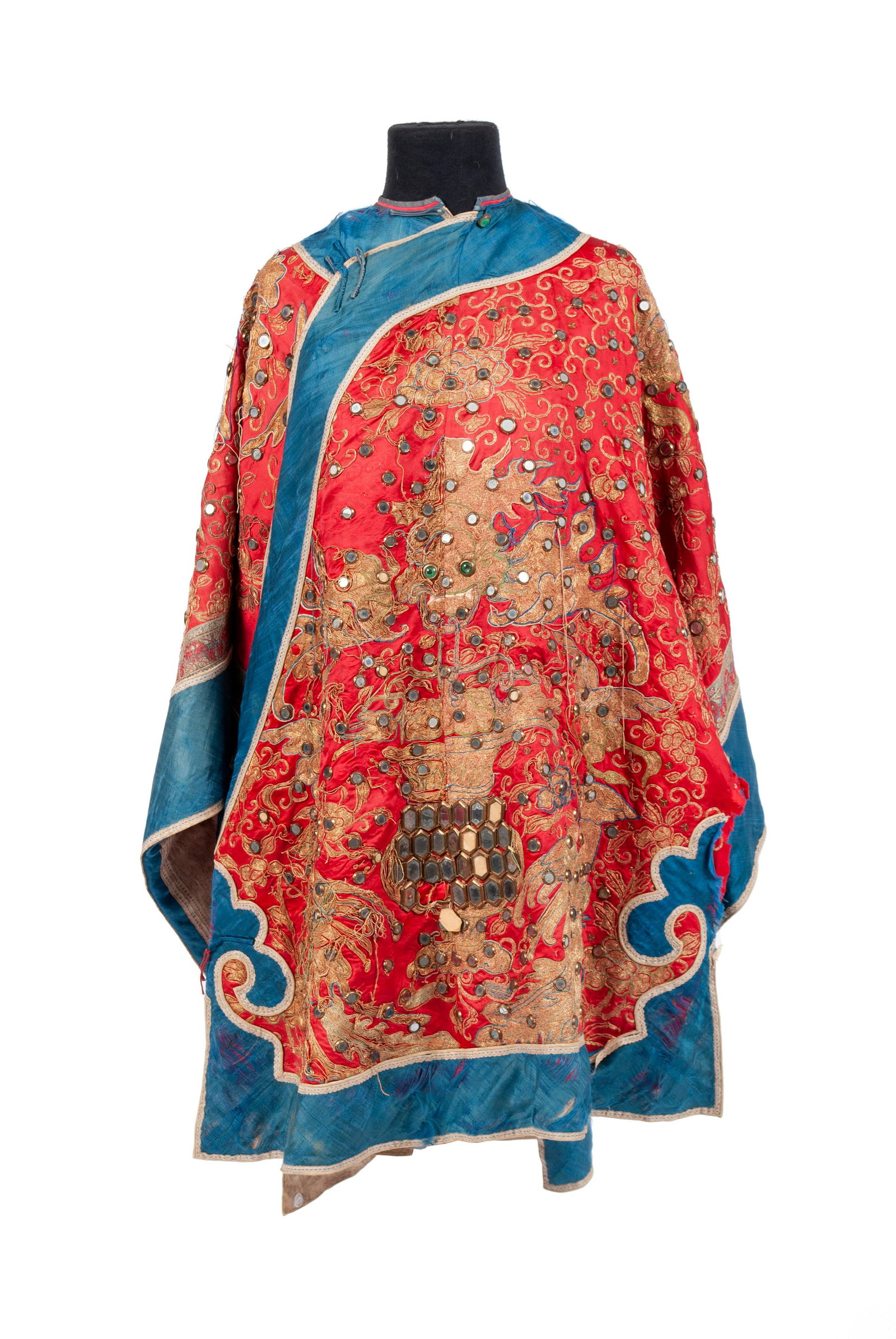 CHINESE RED AND BLUE SILK ROBE: CHINESE RED AND BLUE SILK ROBE Chinese, early-mid 20th c. Likely Tibetan robe decorated with phoenixes and other entities and with mirrored accents throughout. 36" length, shoulders: 49" acr