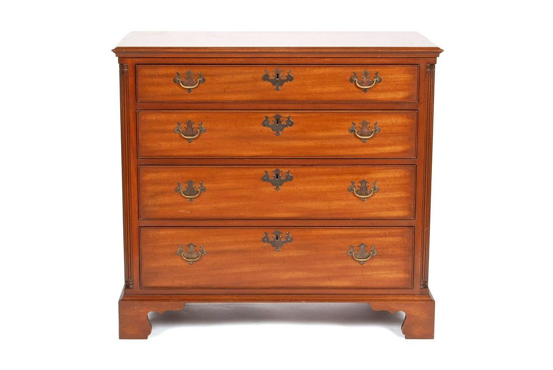 GEORGIAN STYLE MAHOGANY CHEST OF DRAWERS BY KITTINGER: GEORGIAN STYLE MAHOGANY CHEST OF DRAWERS BY KITTINGERLate 20th century. Four long graduated drawers and fluted quarter-columns, on bracket feet.35 1/2 x 19 1/2 x 38 in. (90.17 x 49.53 x 96.52 cm.)