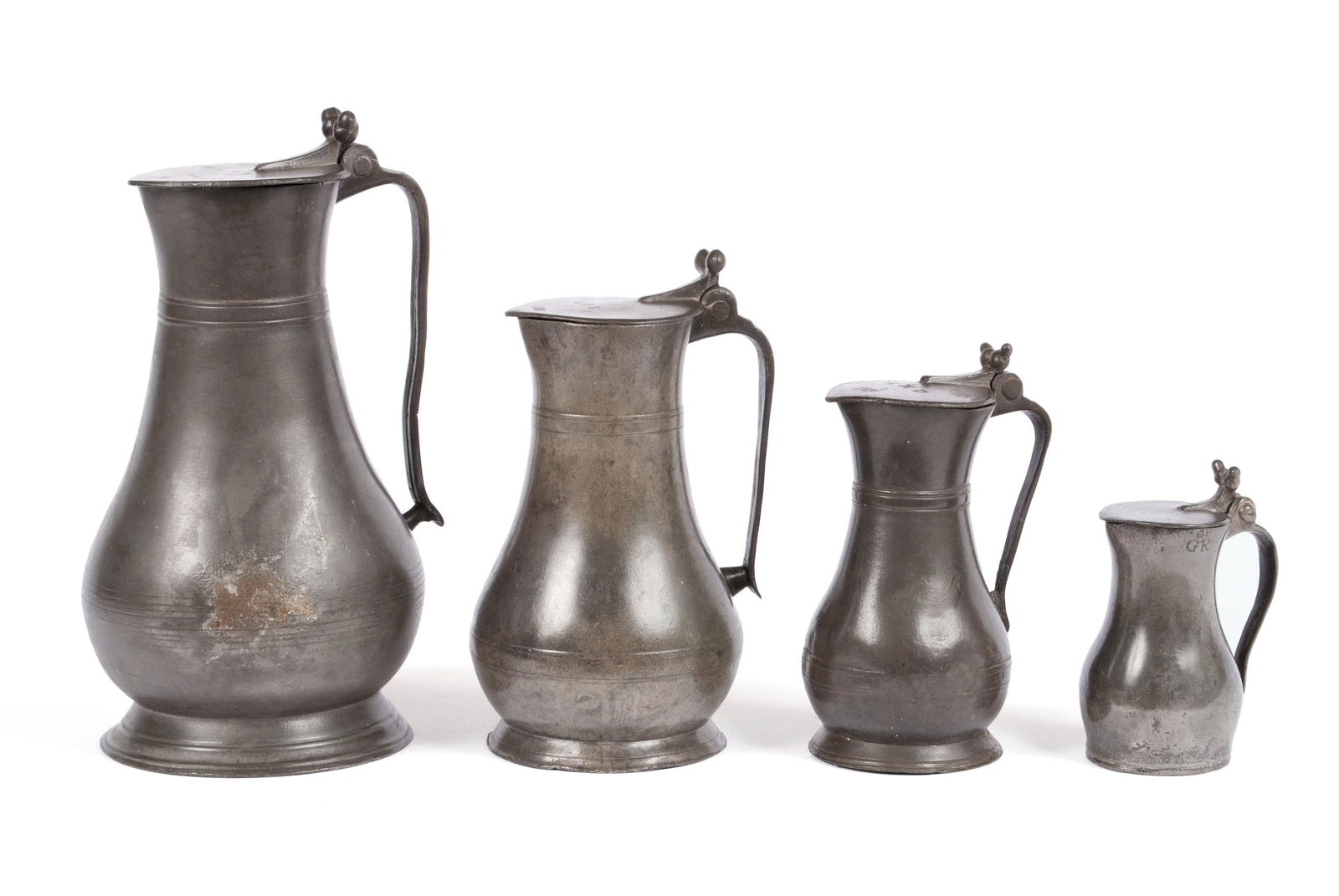 FOUR GRADUATING PEWTER CHANNEL ISLAND MEASURES (1 of 8)