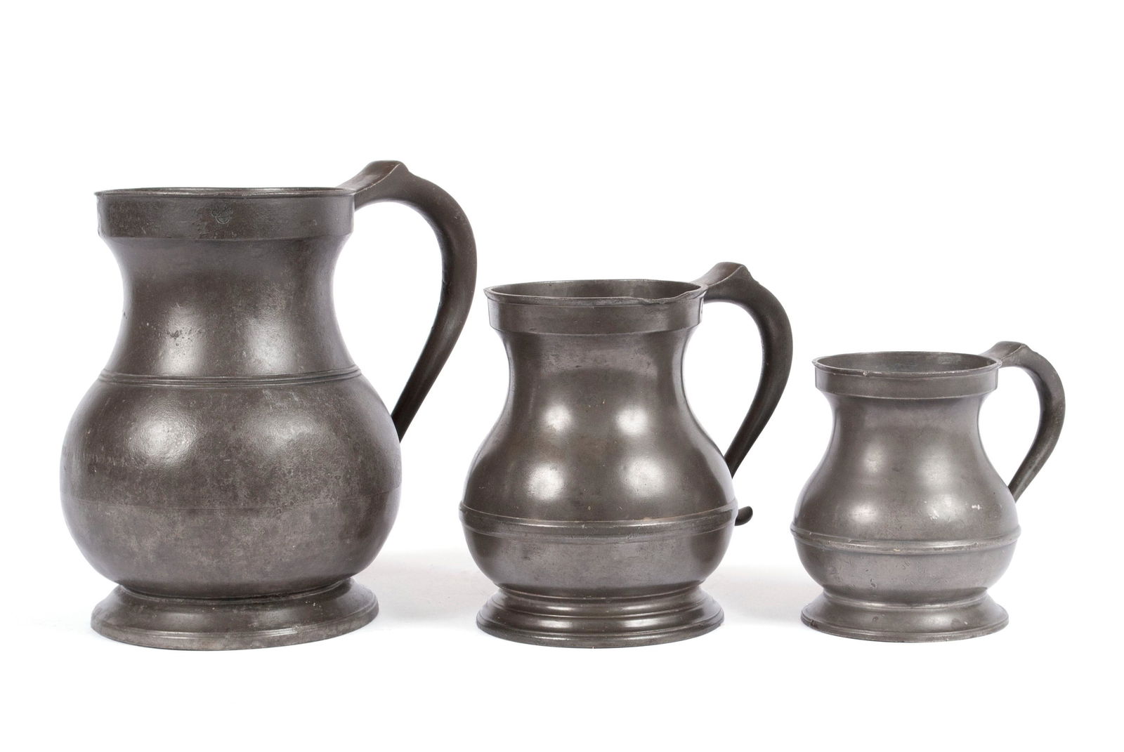 THREE GRADUATED PEWTER MEASURES (1 of 10)