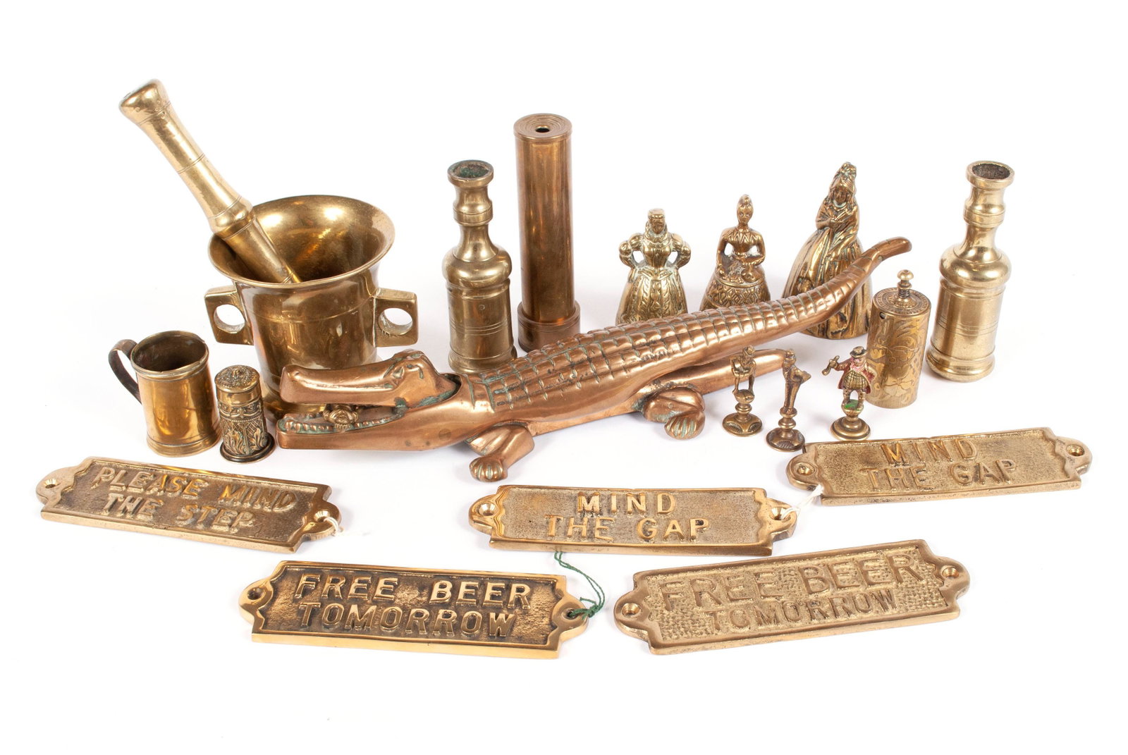 COLLECTION OF DIMINUTIVE ENGLISH BRASS ITEMS: COLLECTION OF DIMINUTIVE ENGLISH BRASS ITEMS England, 19th/20th century. Twenty (20) total pieces, including a kaleidoscope, alligator nutcracker, mortar & pestle, five (5) solid whimsical signs inclu