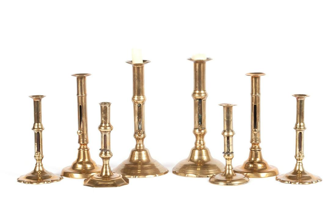FOUR PAIRS ENGLISH BRASS PUSH-UP CANDLESTICKS (1 of 4)