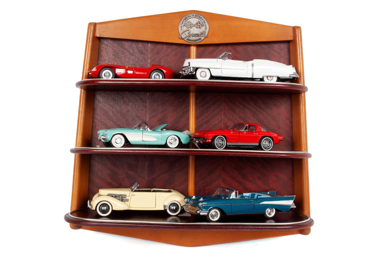 THE OFFICIAL HISTORY OF THE CORVETTE DISPLAY WITH CORVETTE MODEL CARS: THE OFFICIAL HISTORY OF THE CORVETTE DISPLAY WITH CORVETTE MODEL CARS Wall hanging three-tiered display with The Official History of the Corvette plaque and six (6) die-cast model toy cars including: 