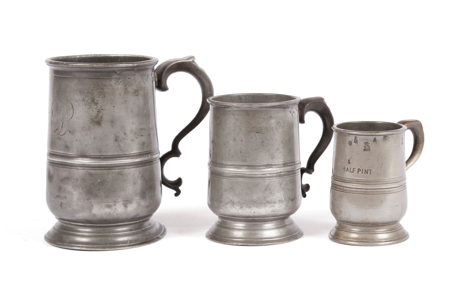 THREE PEWTER MEASURES WITH SCROLLING HANDLES (1 of 11)