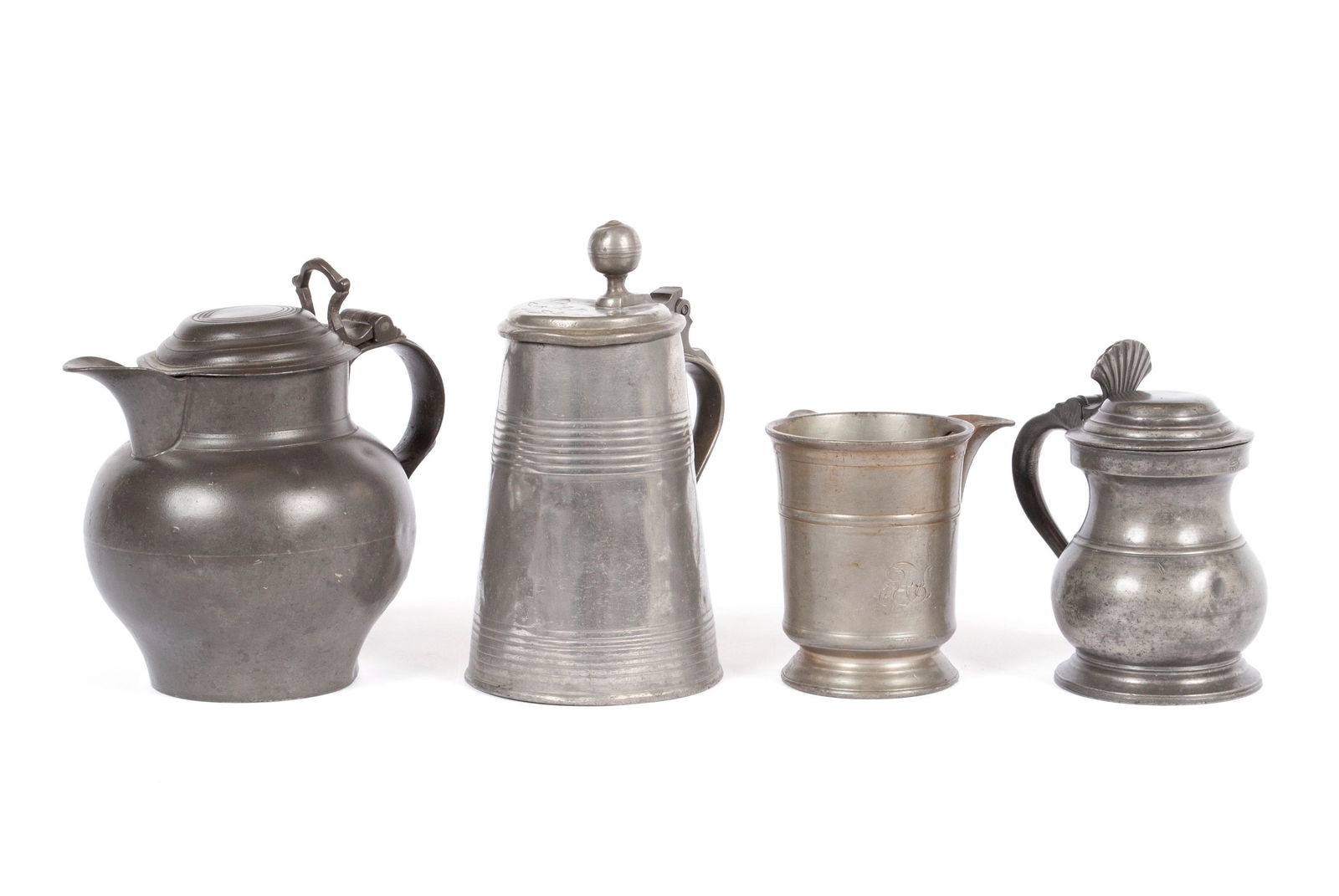 FOUR PEWTER MEASURES (1 of 8)