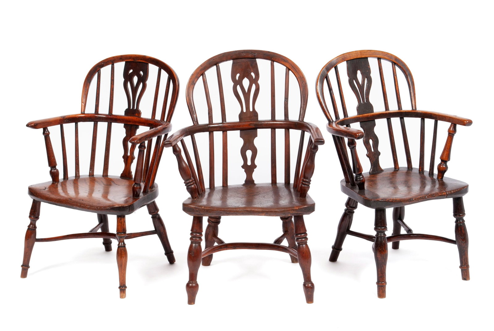 TRIO OF CHILD'S WINDSOR ARMCHAIRS: TRIO OF CHILD'S WINDSOR ARMCHAIRS England, 19th century. Diminutive versions of the classical featherback splat form, turned arms and splayed legs with curved x-stretchers. 25 1/4 x 15 3/4 x 15 in. (6