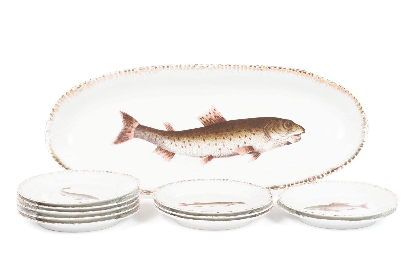 SET OF VICTORIA CARLSBAD FISH PLATES: SET OF VICTORIA CARLSBAD FISH PLATES Austria, late 19th/early 20th century. Transferware designs of assorted fish to the serving platter and ten (10) plates, each with slightly scalloped gilt edges. P