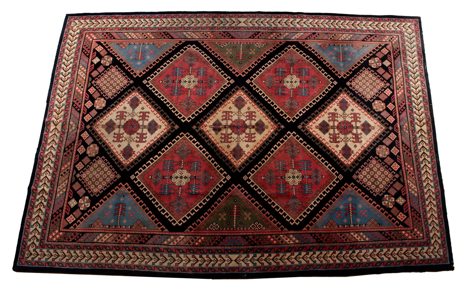 CHINESE ROOM RUG: CHINESE ROOM RUG China, 20th century. Large colorful latch hook medallions lined up angularly on the black field, ivory foliate border with guard borders. 13 ft. 6 in. x 9 ft. 4 in.