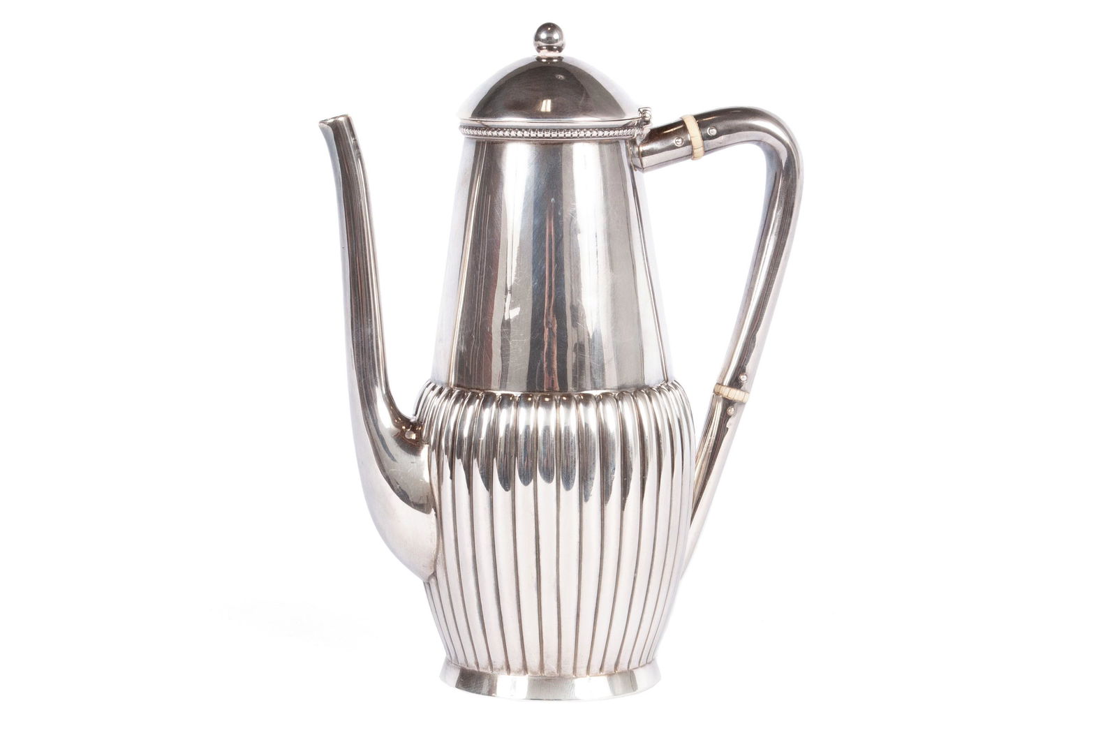 BLACK, STARR, & FROST STERLING TEAPOT: BLACK, STARR, & FROST STERLING TEAPOTNew York. Hallmarked appropriately underfoot, with a half-reeded body and bone accents to the handle.7 1/4 in. (18.42 cm.); 310 grams