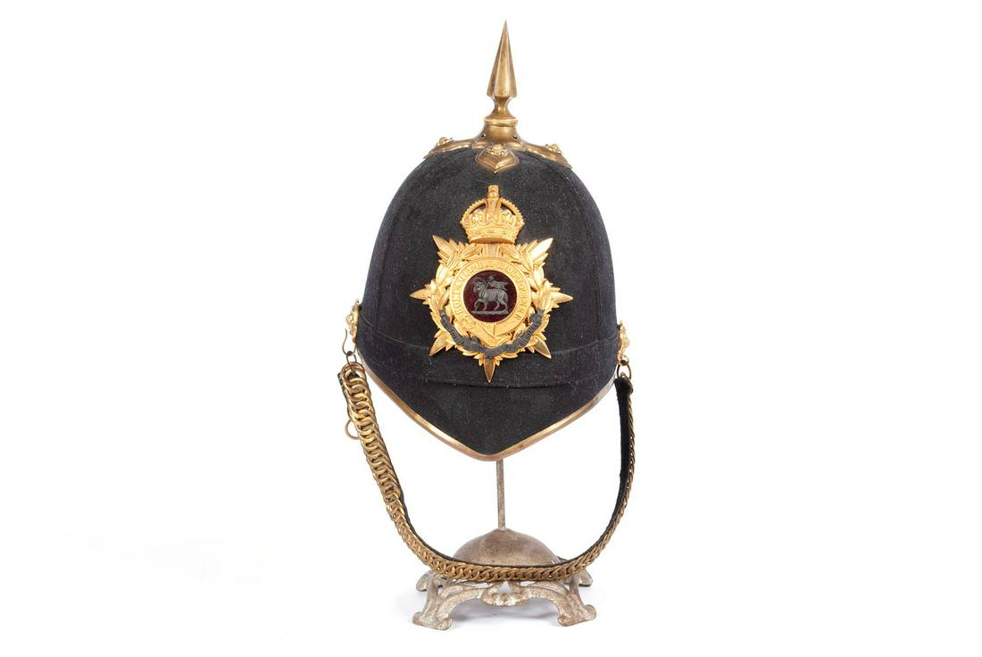 ENGLISH 1878 PATTERN HOME SERVICE HELMET: ENGLISH 1878 PATTERN HOME SERVICE HELMETThe badge centering a paschal lamb on red velvet.