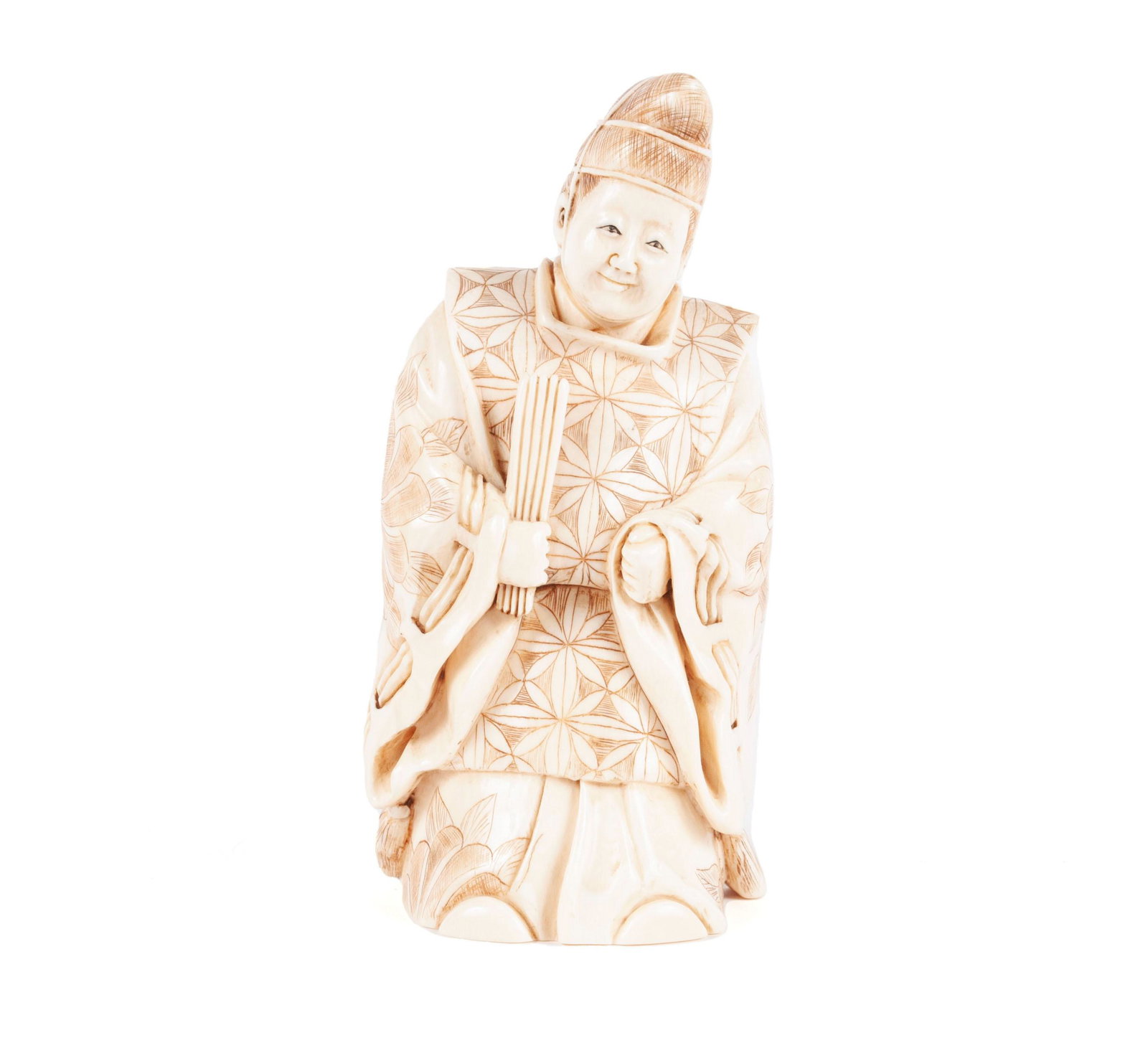 SHINTO MONK OKIMONO: SHINTO MONK OKIMONO Japanese, Meiji era, . The benevolent, upright figure holding a fan, finely decorated with incised patterns to his robes. Signed to underside. 5 in. (12.70 cm.); 310 grams Purchase