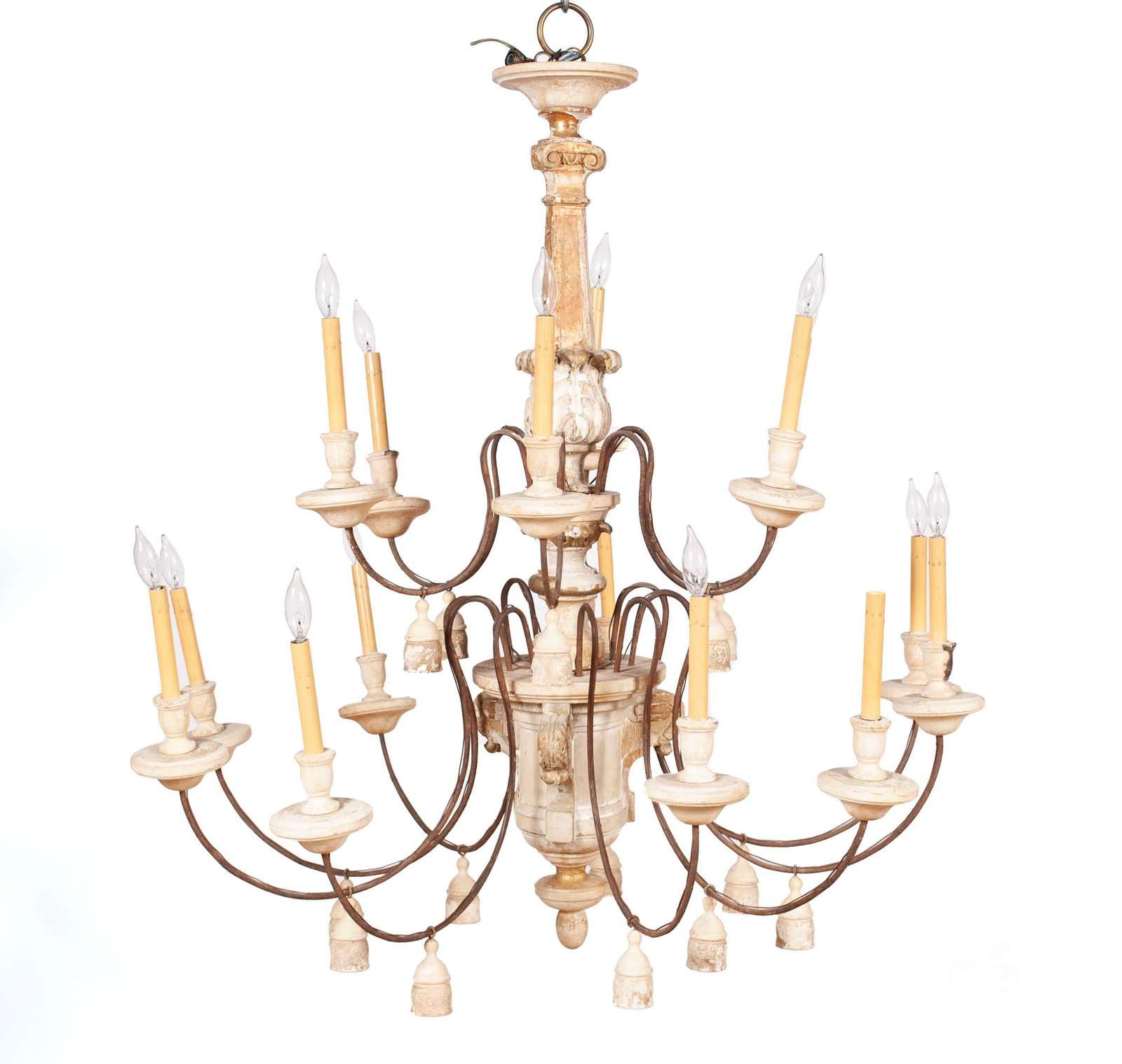 PAINTED WOOD AND WROUGHT IRON CHANDELIER: PAINTED WOOD AND WROUGHT IRON CHANDELIER Continental, 20th century. The fifteen arms each with candle holders and hung with a carved ornamentation each. 58 in. (147.32 cm.) hanging length