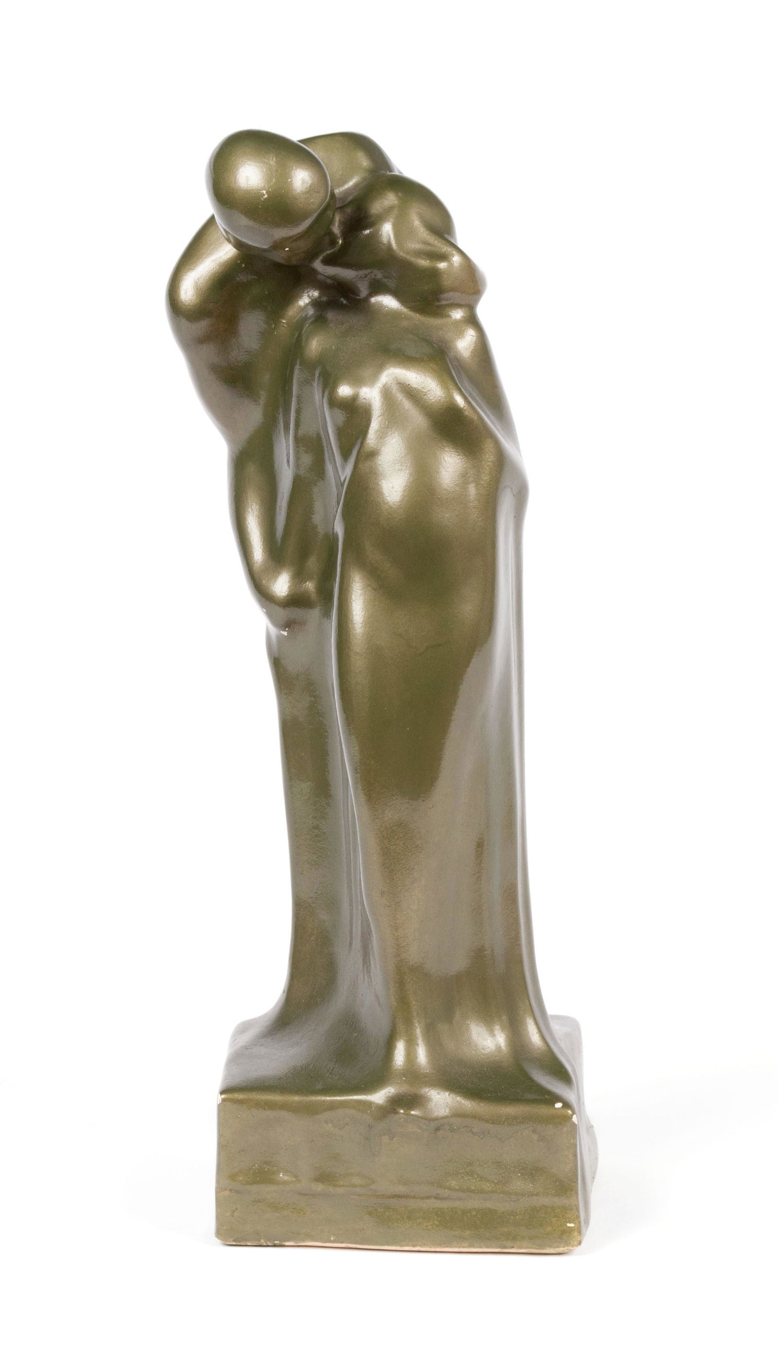 MODERNIST CHALK FIGURE: MODERNIST CHALK FIGUREMan and woman embraced in a kiss, the overall green glaze in the manner of Zsolnay.18 in. (45.72 cm.)
