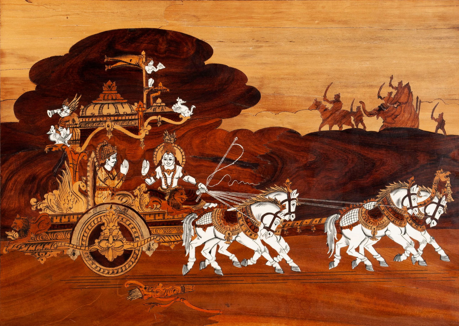 SOUTHEAST ASIAN WOOD INLAY PANEL: HINDU MARQUETRY SCENE Indian, mid-20th century. rosewood framing with other woods. Scenic depiction of Krishna holding the reins of the chariot for Arjuna, the battlefield of Kurukshetra visible on th