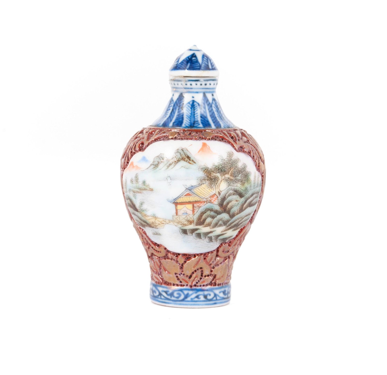 A RETICULATED QIANLONG REIGN MARK AND POEM SNUFF BOTTLE: A RETICULATED QIANLONG REIGN MARK AND POEM SNUFF BOTTLE Chinese, early to mid-20th century, porcelain. The rotating internal cylinder concealed by a rounded baluster form exterior, having mold relief 