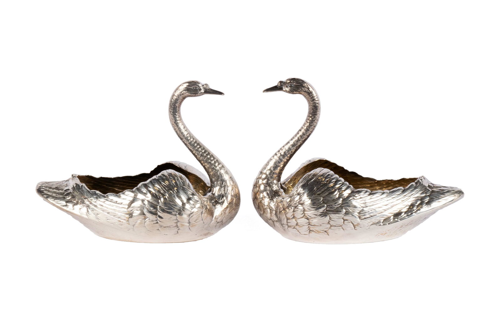 A PAIR OF GORHAM STERLING SWAN POTPOURRIS: A PAIR OF GORHAM STERLING SWAN POTPOURRISAmerican, early 20th century, sterling. Realistically modeled swan forms with parcel gilt interiors, hallmarked, #33, no grille.6 1/2 x 8 x 5 in. (16.51 x 20.3