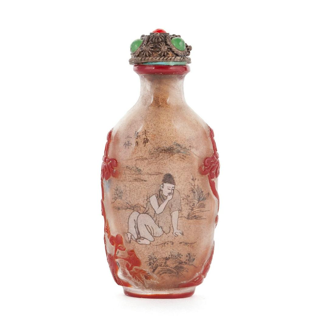 A RARE CINNABAR OVERLAY REVERSE-PAINTED SNUFF BOTTLE (1 of 7)