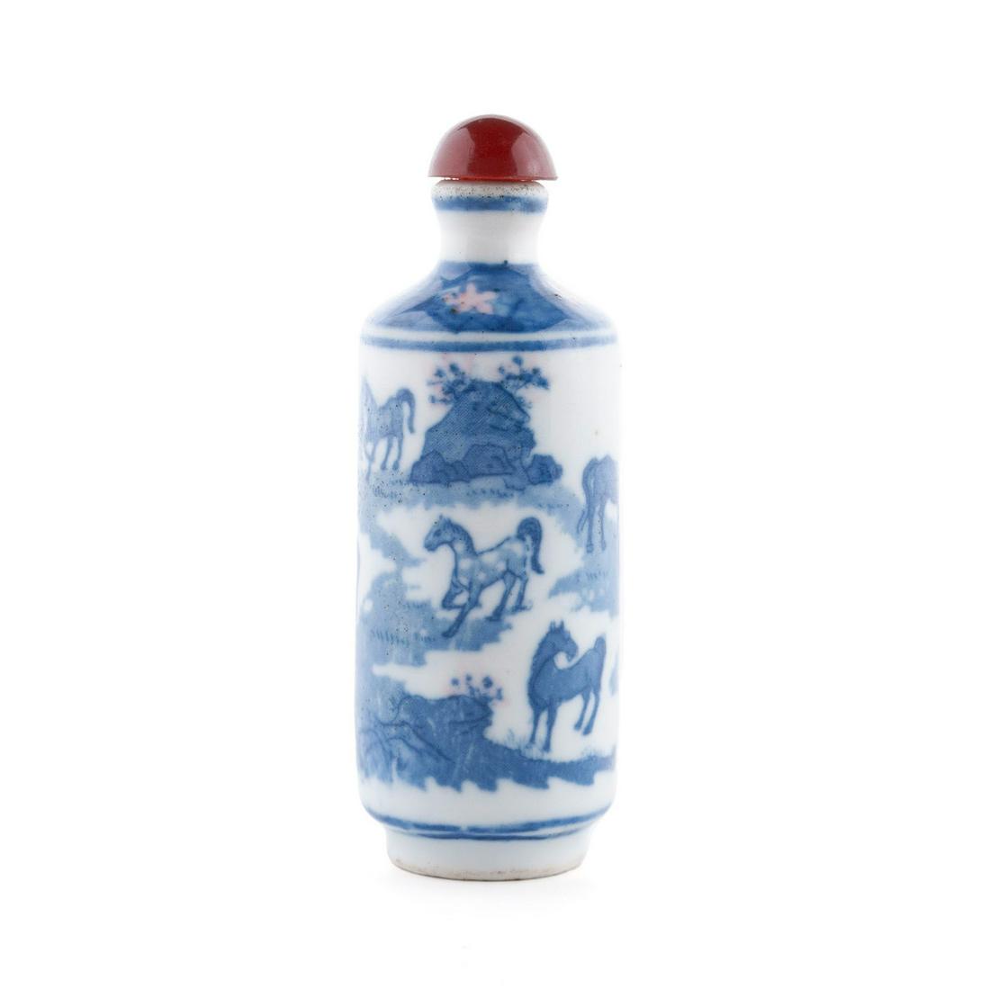 A BLUE AND WHITE EIGHT-HORSE SNUFF BOTTLE (1 of 6)