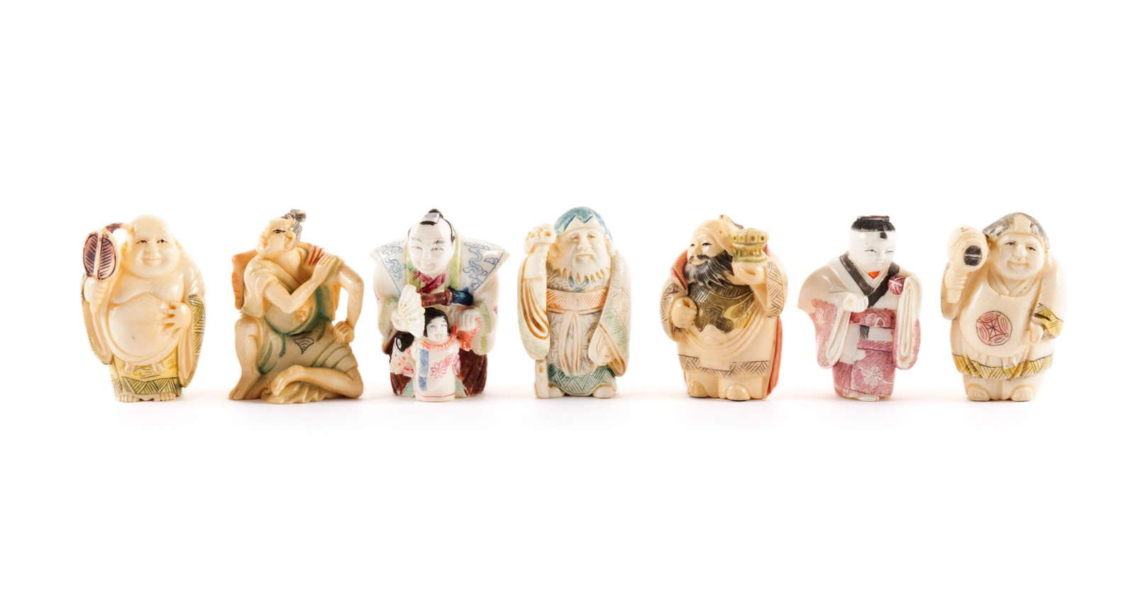 SEVEN FIGURAL OKIMONO AND NETSUKE: SEVEN FIGURAL OKIMONO AND NETSUKE Japanese, 20th century, dyed organic material. Including samurai, Hotei, a jovial boy in kimono, and others; the okimono unsigned. Tallest: 2 in. (5.1 cm.)