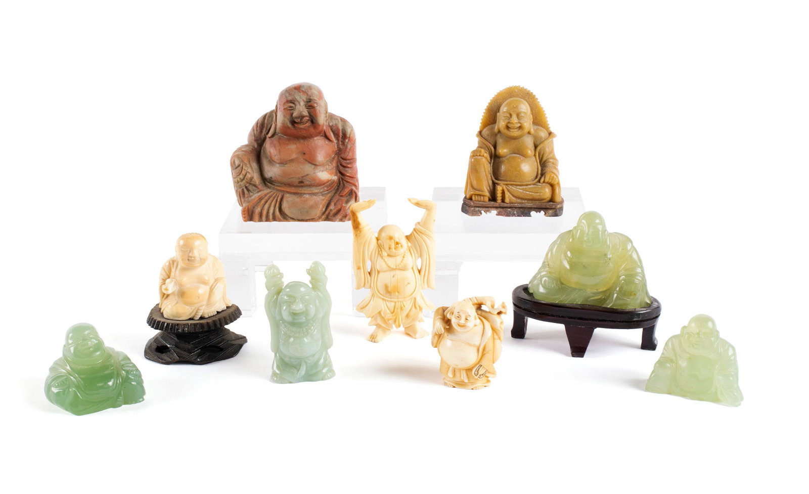SELECTION OF NINE BUDDHA CARVINGS: SELECTION OF NINE BUDDHA CARVINGS Early to mid-20th century, jade and Shoushan. All carvings in the form of the iconic deity. 3 1/2 in. (8.9 cm.)