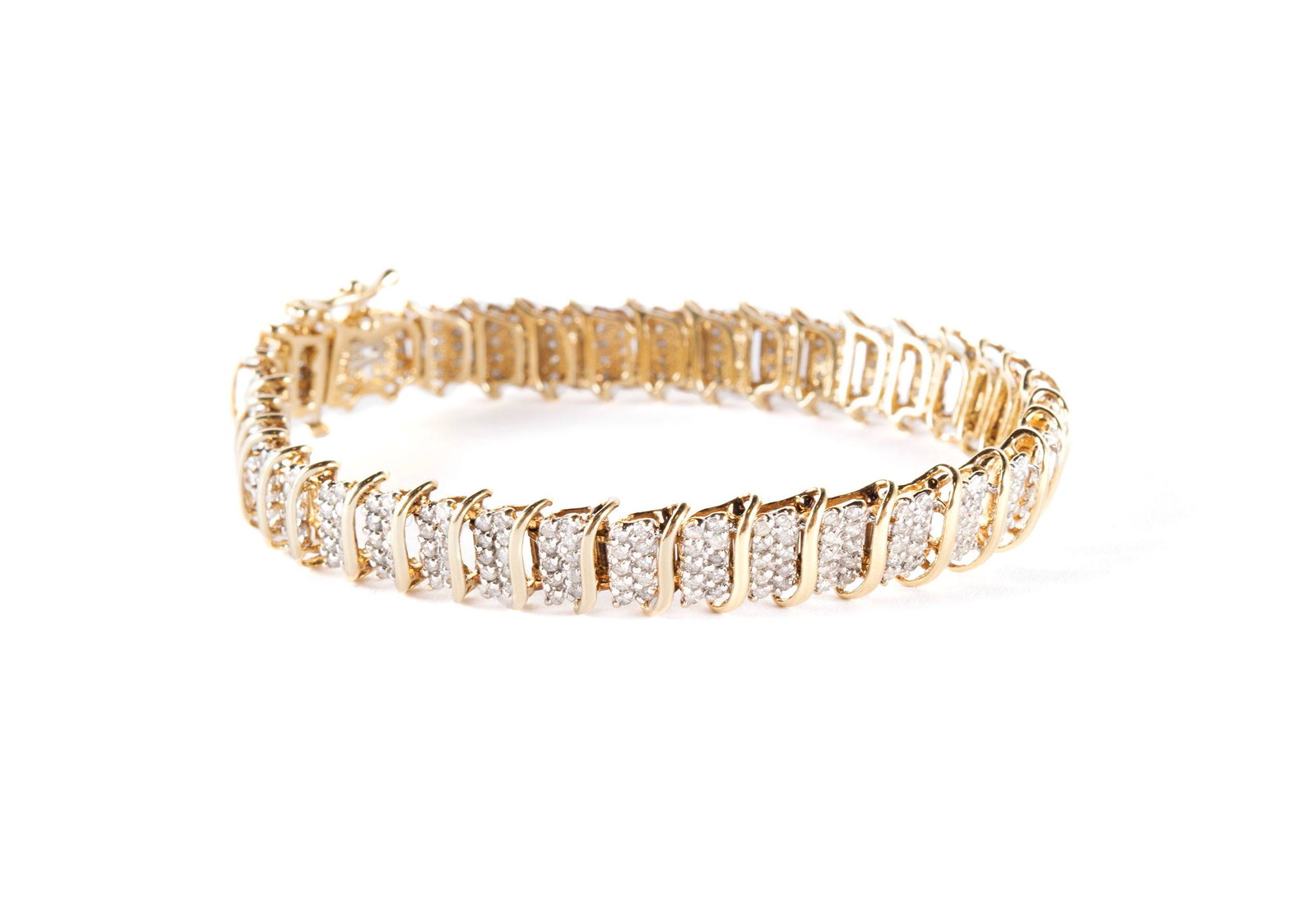 YELLOW GOLD DIAMOND BRACELET: YELLOW GOLD DIAMOND BRACELET A 10k yellow gold bracelet of thirty-eight (38) links each set with ten (10) melee diamonds, hallmarked to clasp. 1/4 in. x 7 1/4 in. (0.6 x 18.4 cm.)