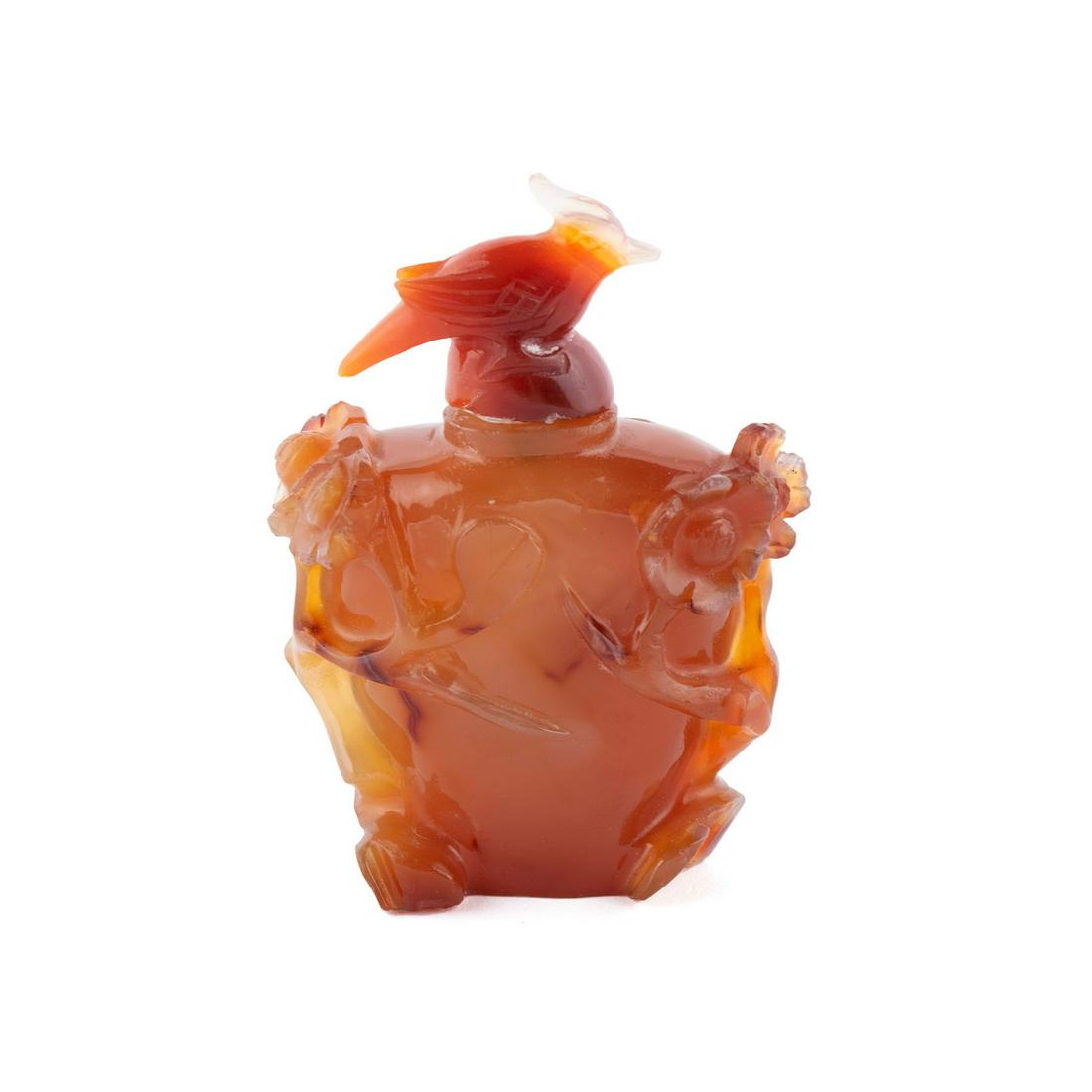 A CARNELIAN FLORA CARVED SNUFF BOTTLE (1 of 6)