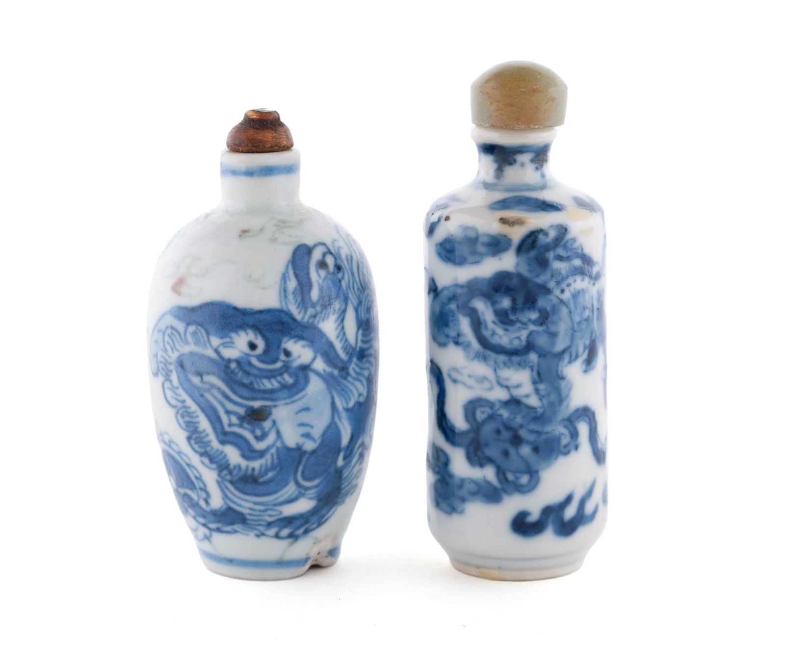 TWO BLUE AND WHITE PORCELAIN FOO LION SNUFF BOTTLES (1 of 6)
