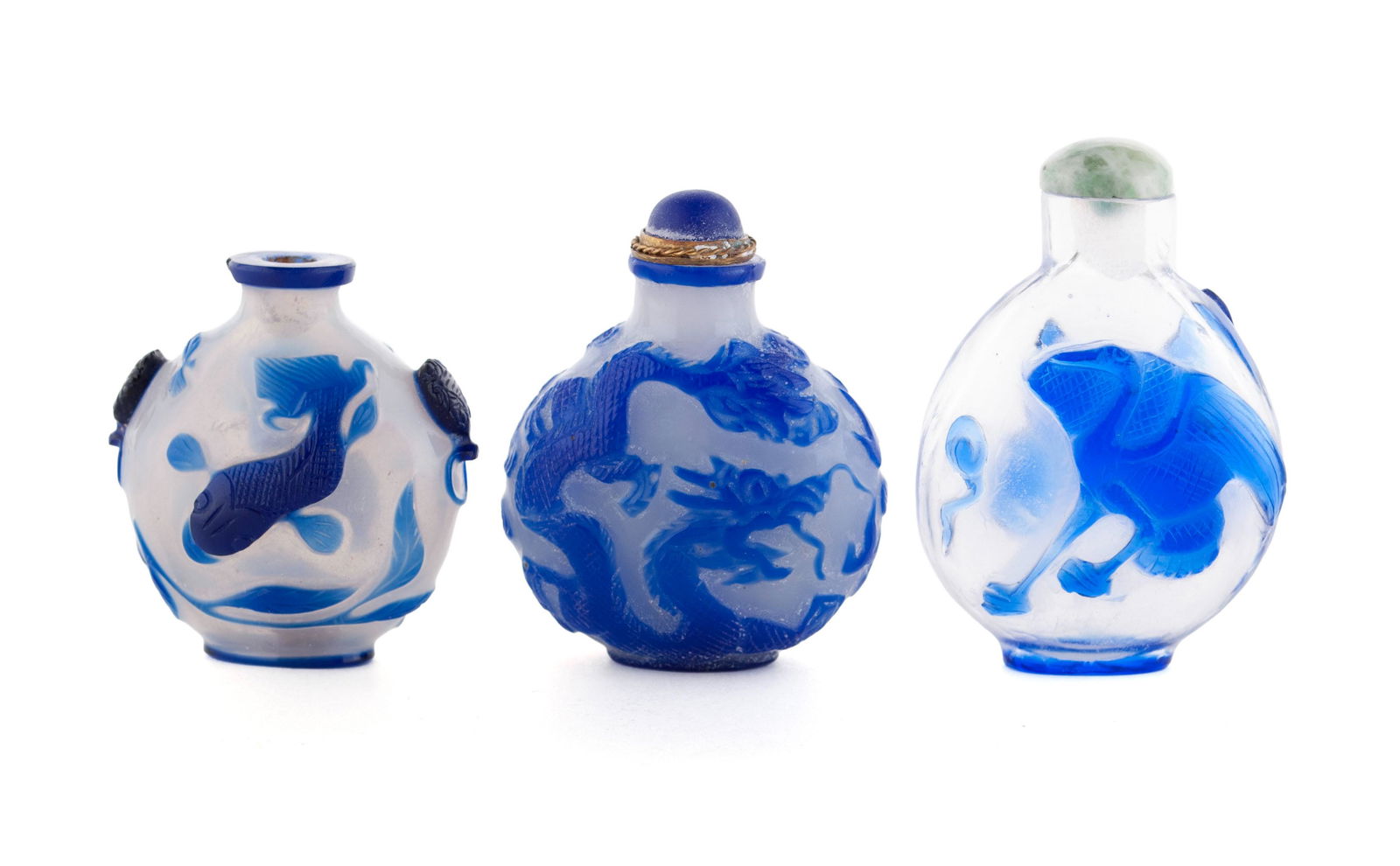 THREE SAPPHIRE BLUE OVERLAY GLASS SNUFF BOTTLES (1 of 7)