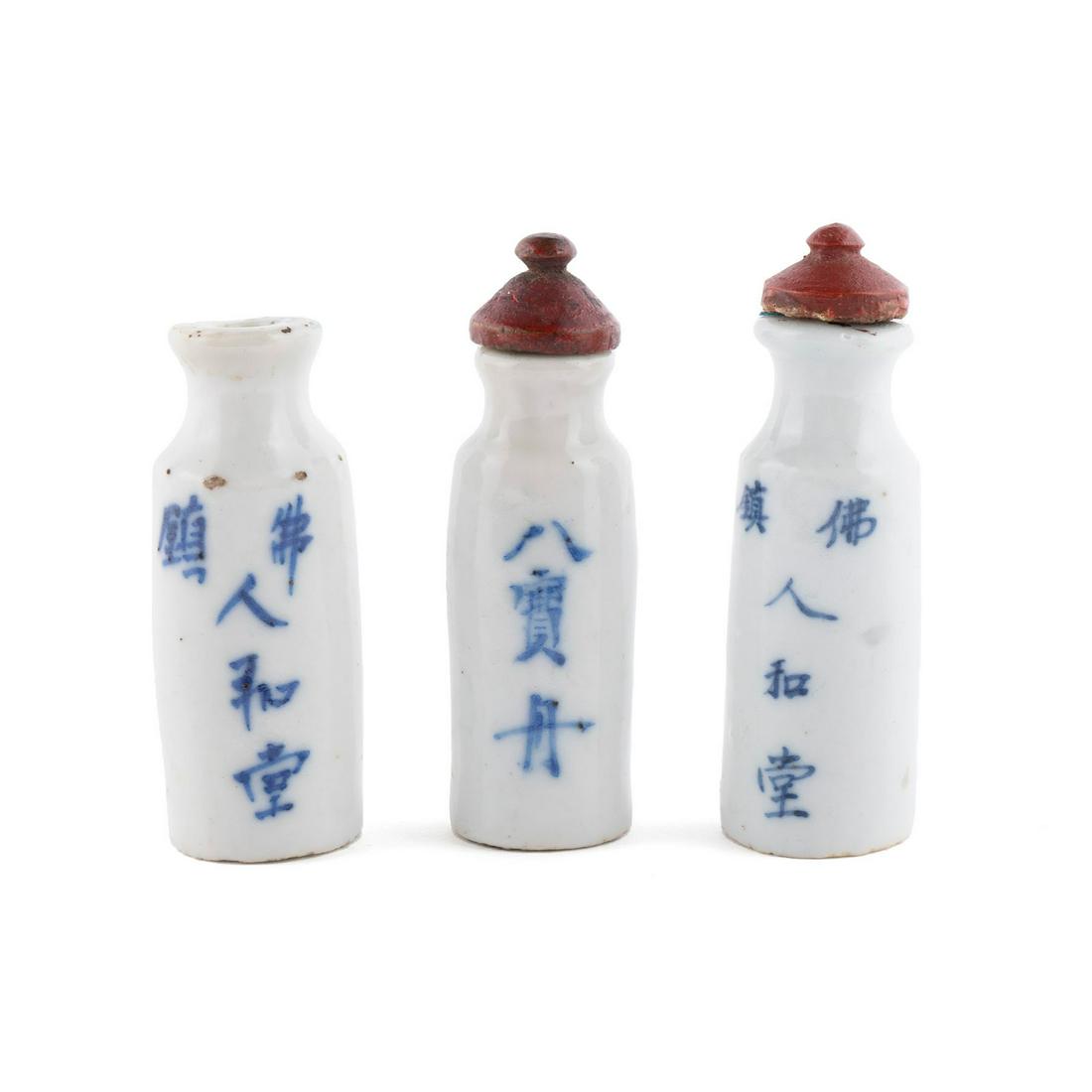 THREE CALLIGRAPHY PORCELAIN SNUFF BOTTLES (1 of 6)