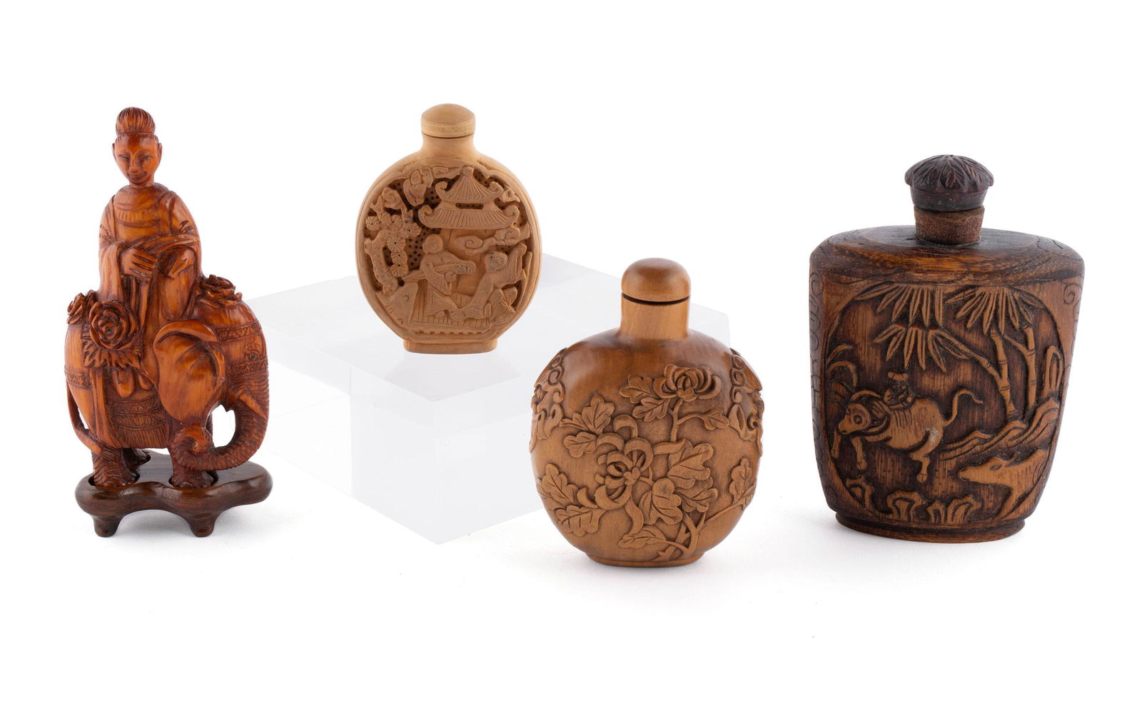 FOUR ORGANIC MATERIAL CARVED SNUFF BOTTLES (1 of 7)