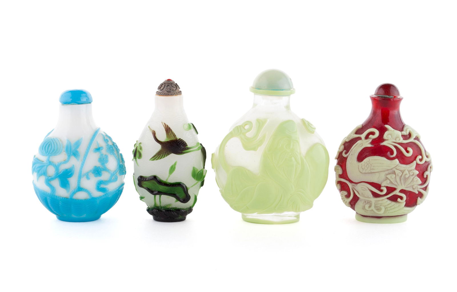FOUR COLORED OVERLAY GLASS SNUFF BOTTLES (1 of 6)