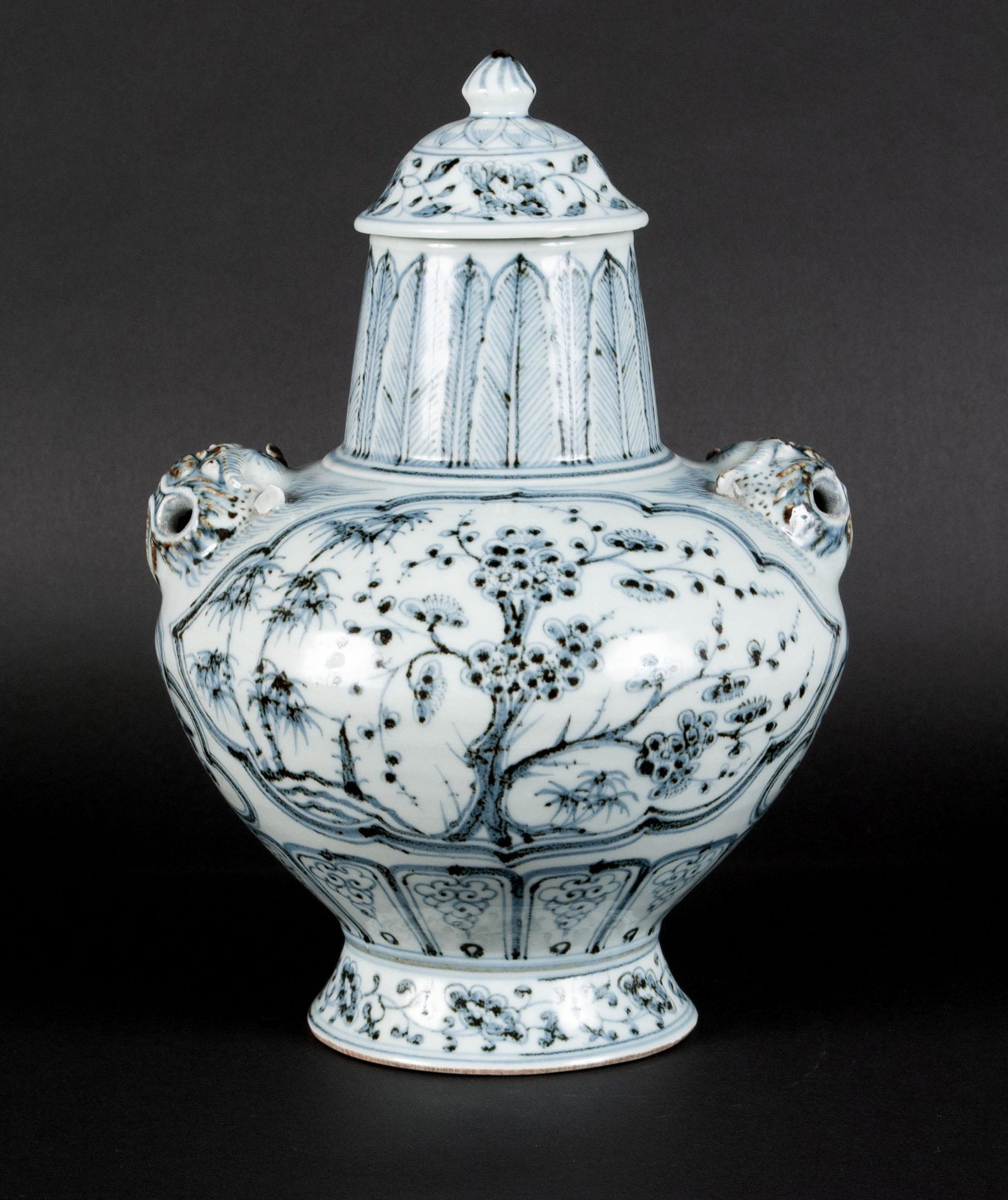 BLUE AND WHITE MOLDED PORCELAIN LIDDED VASE (1 of 9)