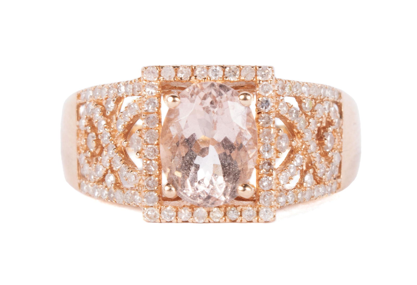 ROSE GOLD MORGANITE AND DIAMOND RING: ROSE GOLD MORGANITE AND DIAMOND RINGA 14k rose gold ring with central oval morganite set in squared halo of round diamonds, shank featuring open lacy work with prong set diamonds throughout and along