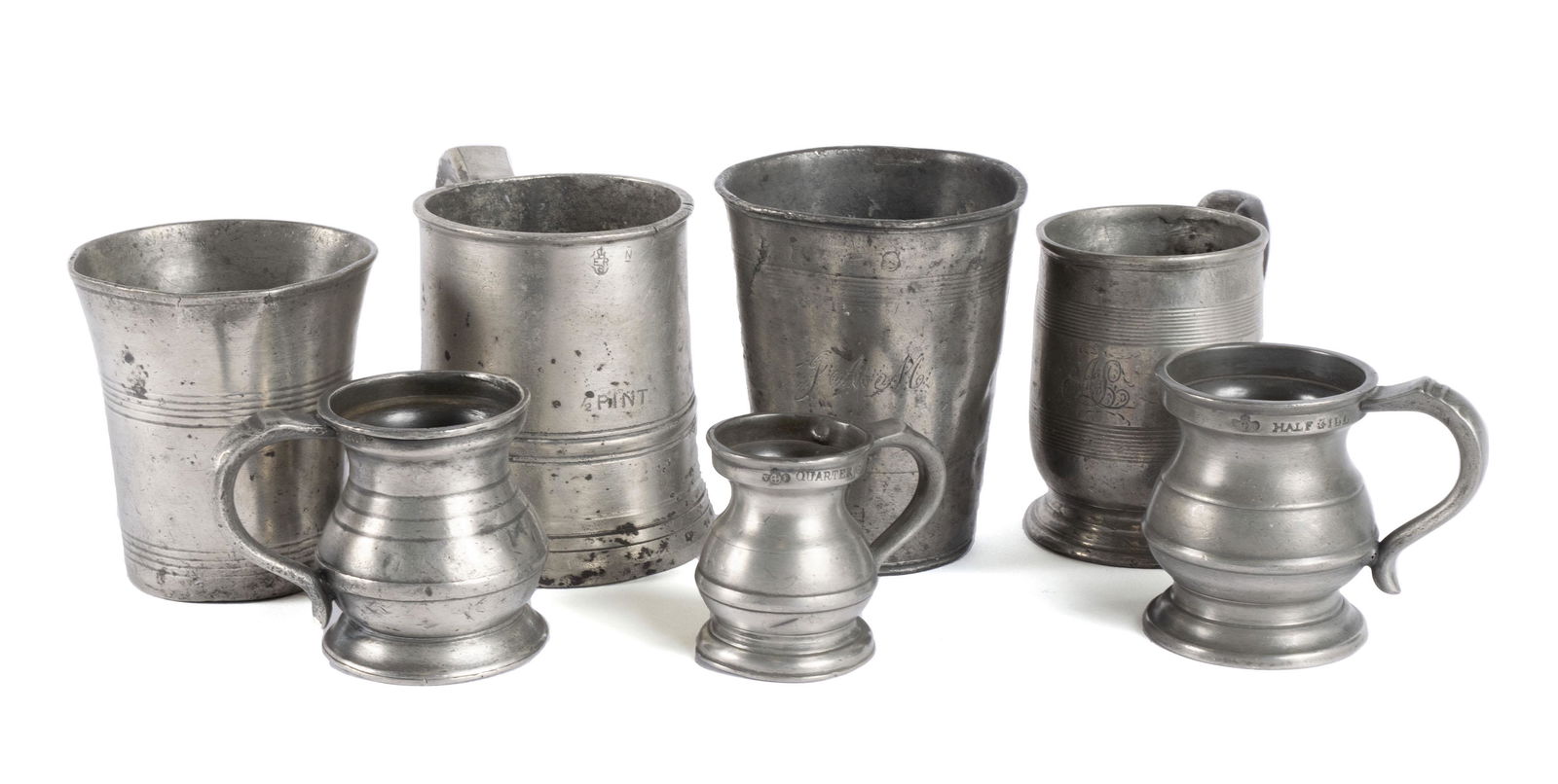SEVEN PEWTER MEASURES (1 of 9)