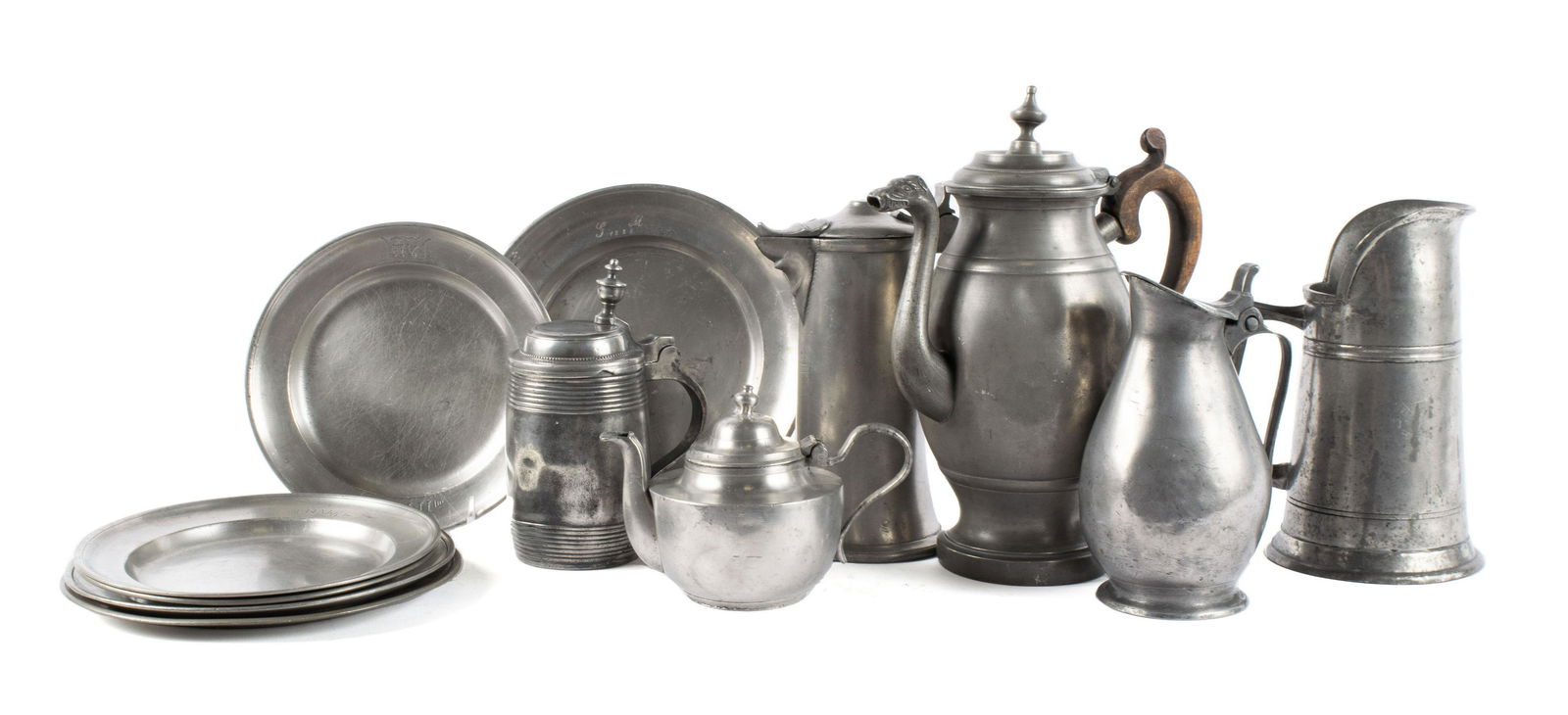 COLLECTION OF FRENCH AND GERMAN PEWTER: COLLECTION OF FRENCH AND GERMAN PEWTERTwelve pieces. Continental, 18th/19th century. German pieces Include a barrel form lidded stein marked under lid, small teapot with worn touch marks to the bottom