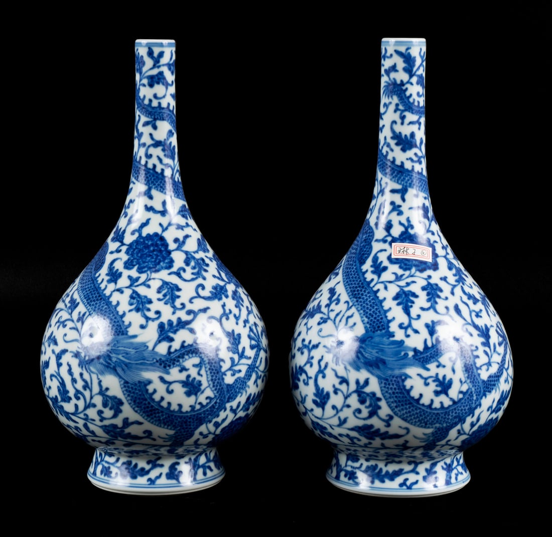 PAIR OF BLUE AND WHITE BOTTLE VASES (1 of 8)