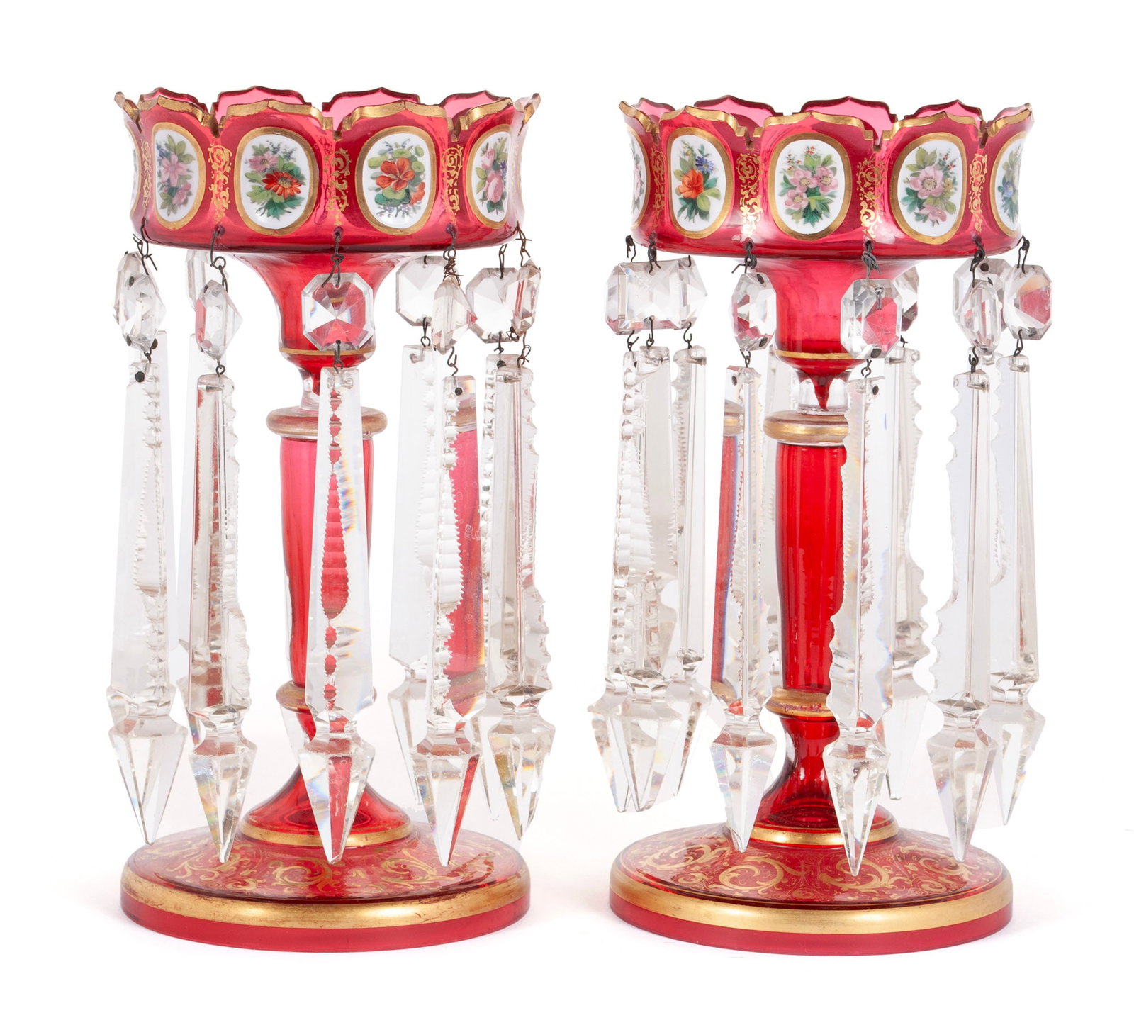 PAIR OF BOHEMIAN RUBY LUSTERS: PAIR OF BOHEMIAN RUBY LUSTERS Continental, early 20th century, glass. Each of gilt-lined monteith rims with hand-painted floral bouquet plaques dangling long and tapering cut crystal prisms surroundin