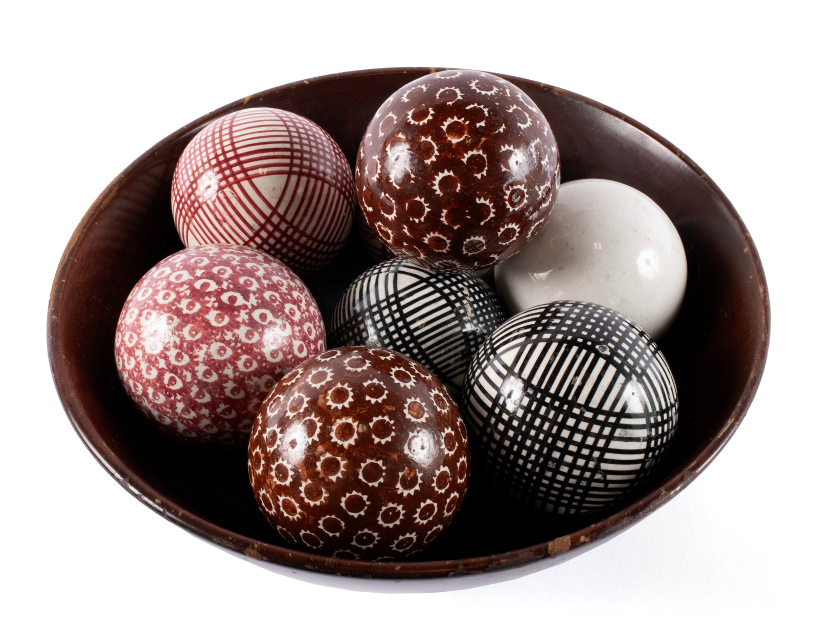 VICTORIAN CARPET BALLS: VICTORIAN CARPET BALLS Scottish, mid-19th century, ceramic. Eight (8) hand-painted carpet balls of varying patterns with a hand-turned antique wooden bowl. Approximate diameters: 3 1/2 in. (8.9 cm.) T