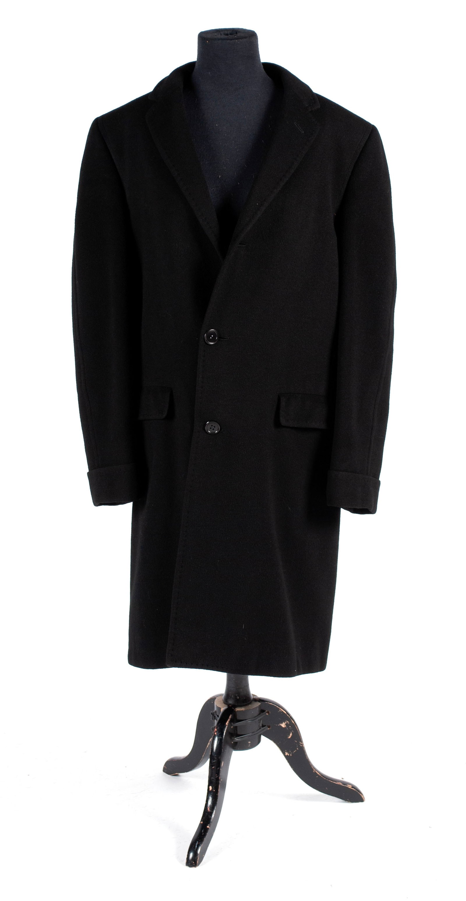 DHALISHAN BLACK CASHMERE OVERCOAT: DHALISHAN BLACK CASHMERE OVERCOAT Men's 100% cashmere coat, c. 1970s. Having notched lapel, three buttons (one missing), two flap pockets to exterior, and one slip pocket to interior. Tailored express