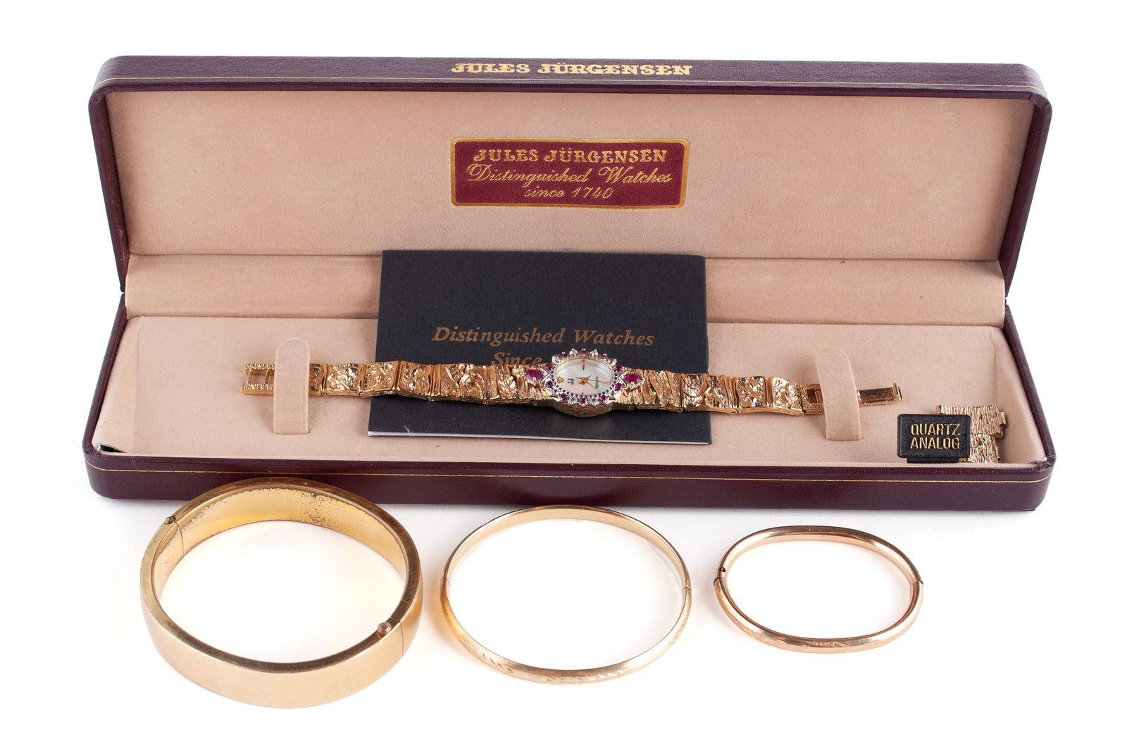 JULES JURGENSEN WATCH AND THREE GOLD BANGLES (1 of 17)
