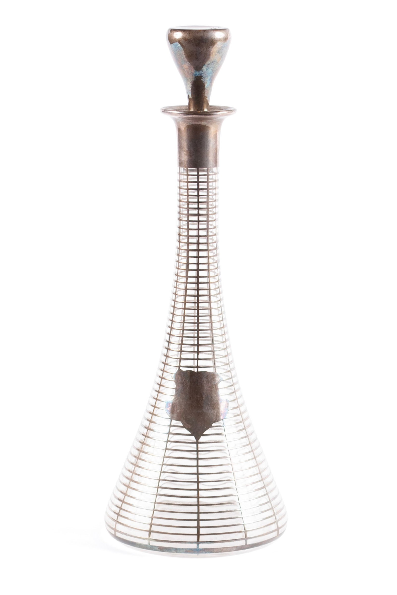 MCM SILVER OVERLAY GLASS DECANTER: MCM SILVER OVERLAY GLASS DECANTER Mid-20th century, glass and silver. Of widening form with silver latticework overlay of monogram cartouche. Unmarked. 11 3/4 x 4 in. (29.8 x 10.2 cm.)
