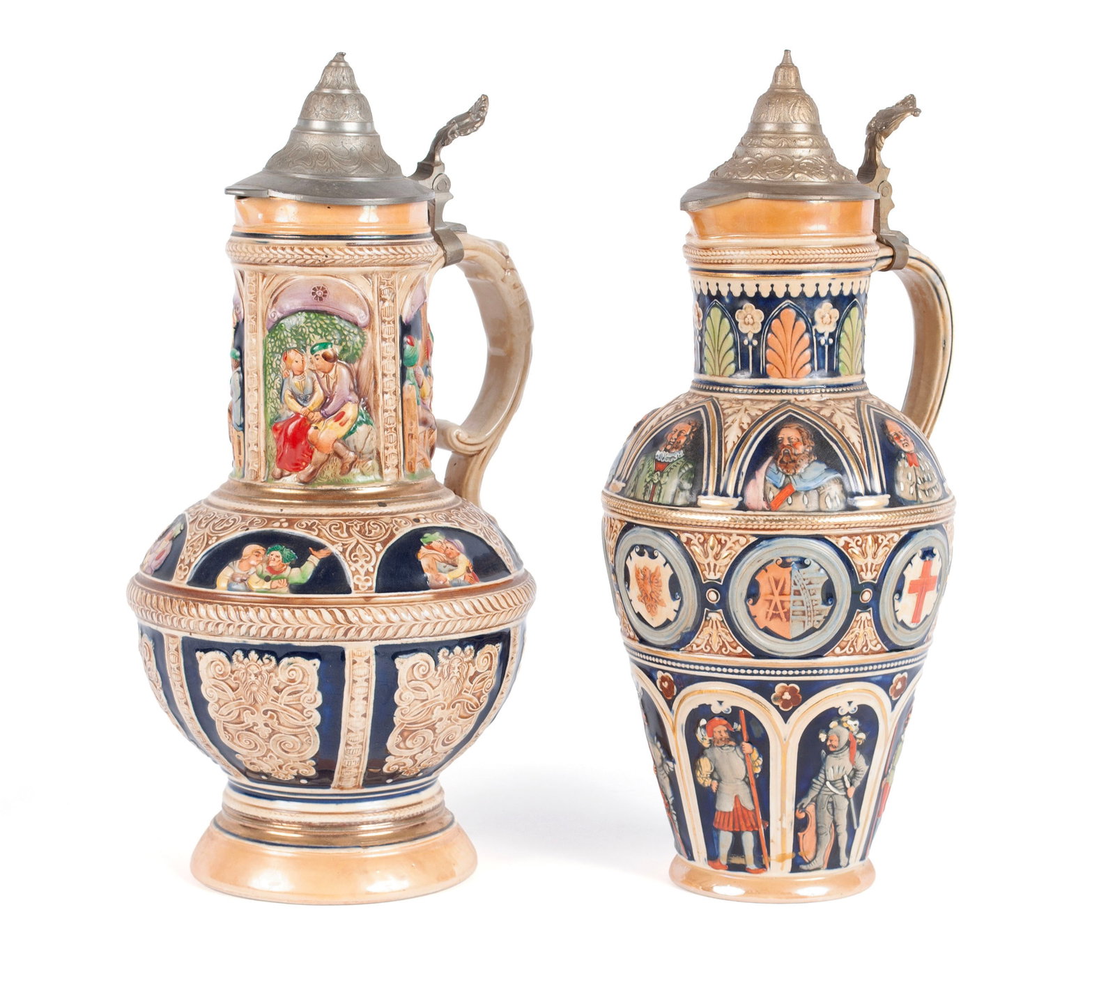 TWO GERMAN STONEWARE PITCHER STEINS: TWO GERMAN STONEWARE PITCHER STEINS German. One marked for Marzi and Remy #512, the other marked "Made in Germany". Both decorated with panels of portraiture, pub scenes and shields, and mou