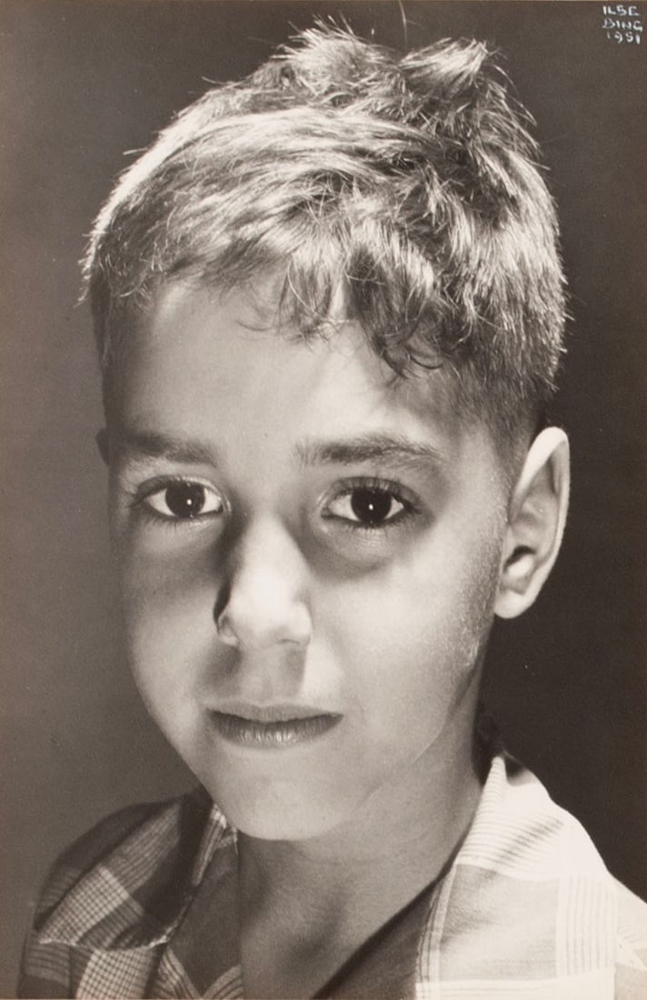 ILSE BING (GERMAN, 1899-1998): Ilse BingGerman, 1899-1998Little Boy, 1951Silver gelatin photographic print, inscribed upper right and to versoBust portrait of a young boy, mounted to cardstock.6 3/4 x 4.7 in. (17.1 x 11.9 cm.), ca