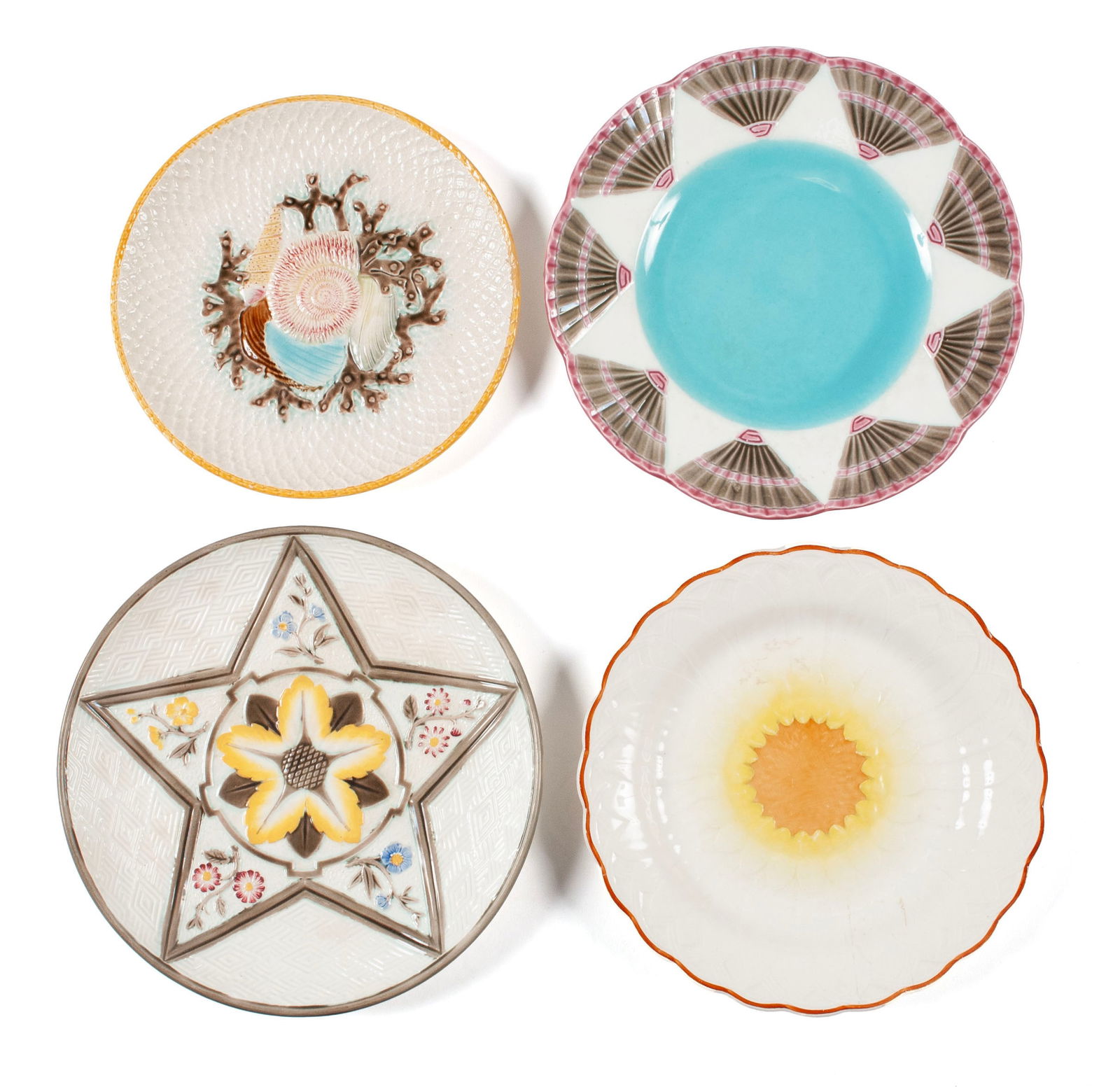 FOUR IVORY MAJOLICA PLATES (1 of 12)